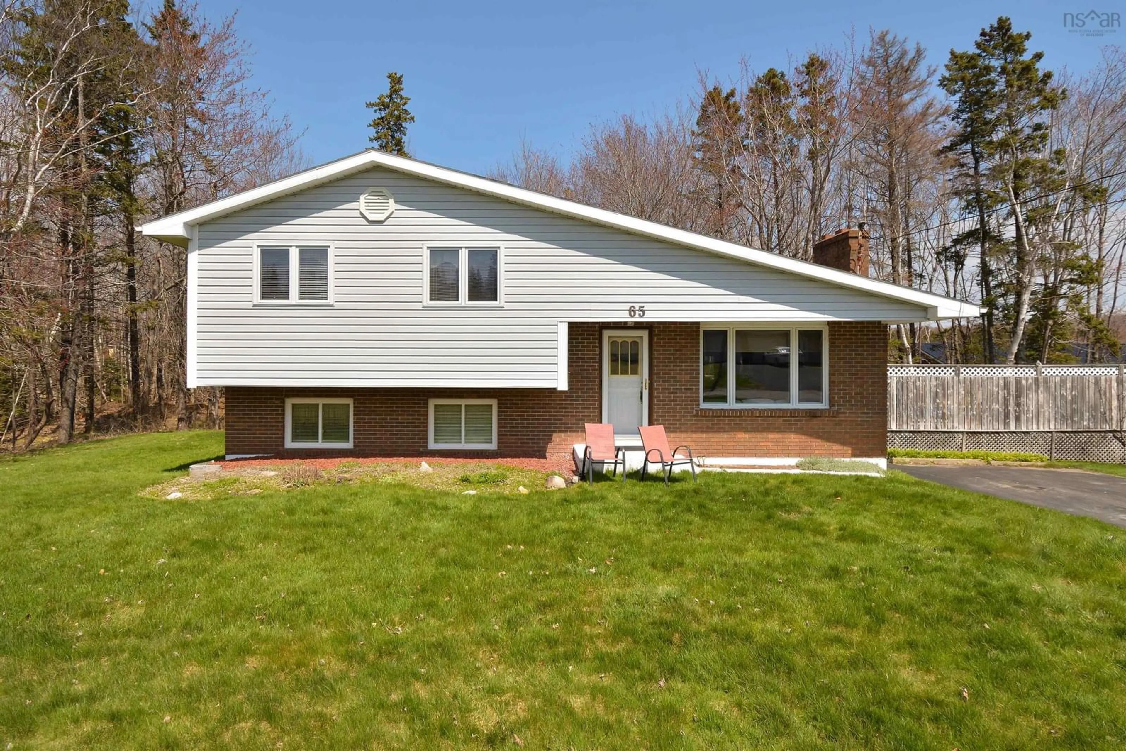 Home with vinyl exterior material, street for 65 Parkwood Dr, Sydney Nova Scotia B1S 1H6