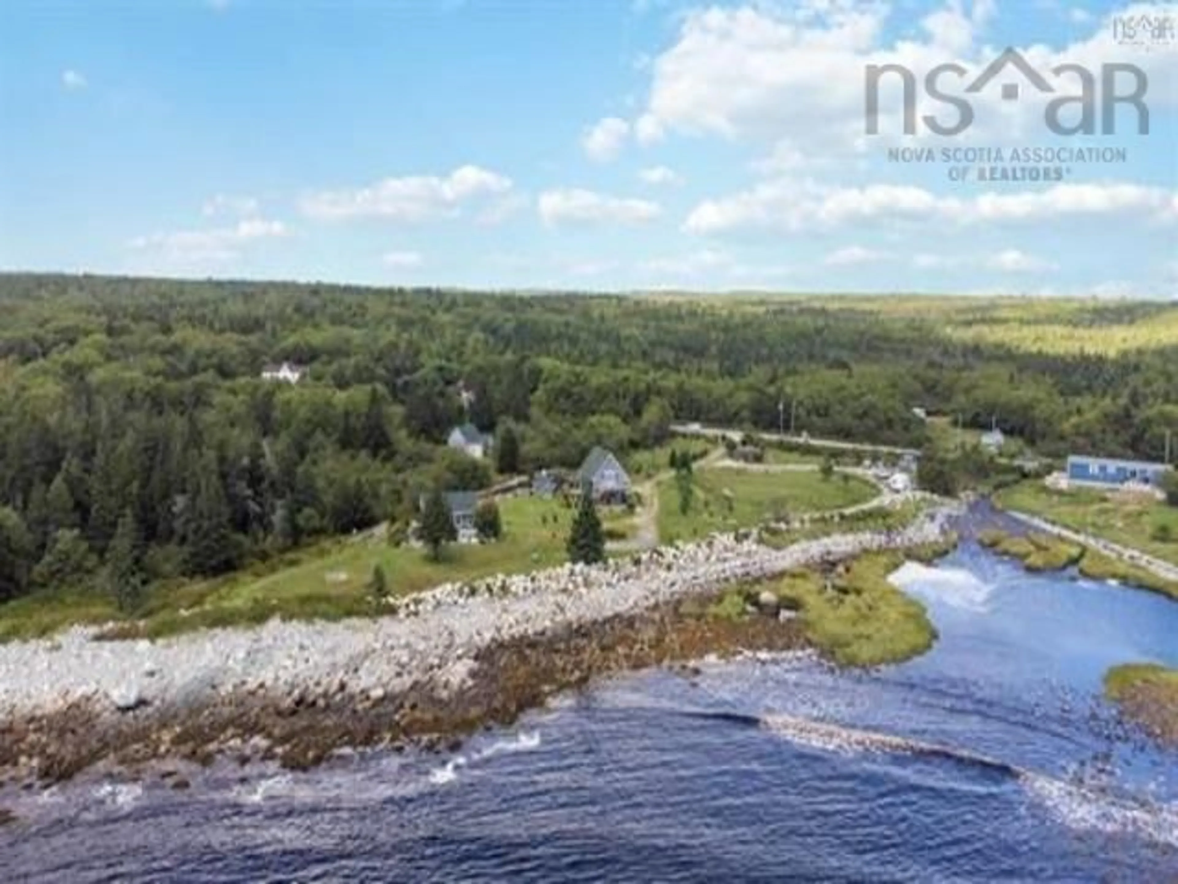 A pic from outside/outdoor area/front of a property/back of a property/a pic from drone, water/lake/river/ocean view for 2710 Sandy Point Rd, Sandy Point Nova Scotia B0T 1W0