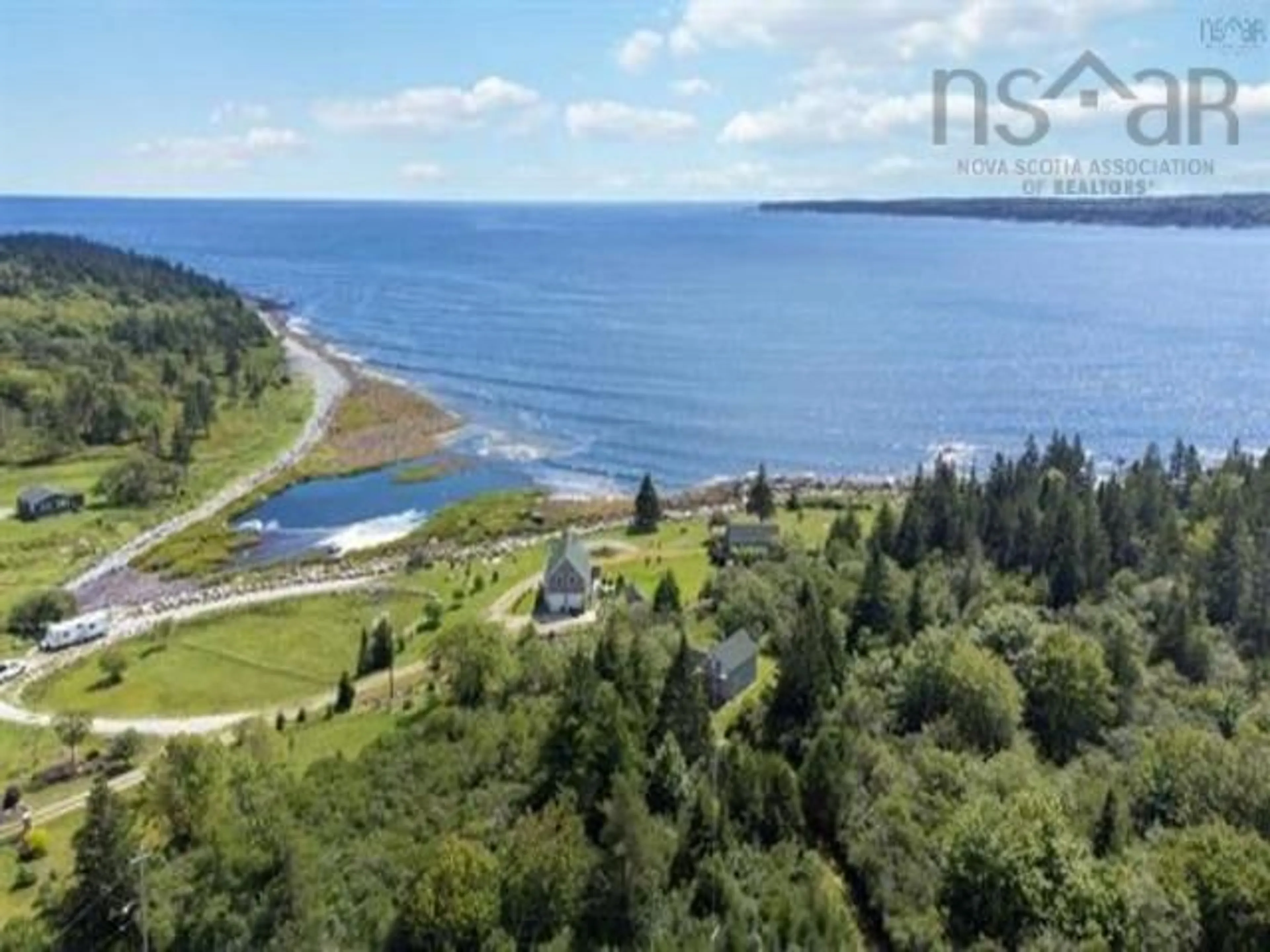 A pic from outside/outdoor area/front of a property/back of a property/a pic from drone, water/lake/river/ocean view for 2710 Sandy Point Rd, Sandy Point Nova Scotia B0T 1W0