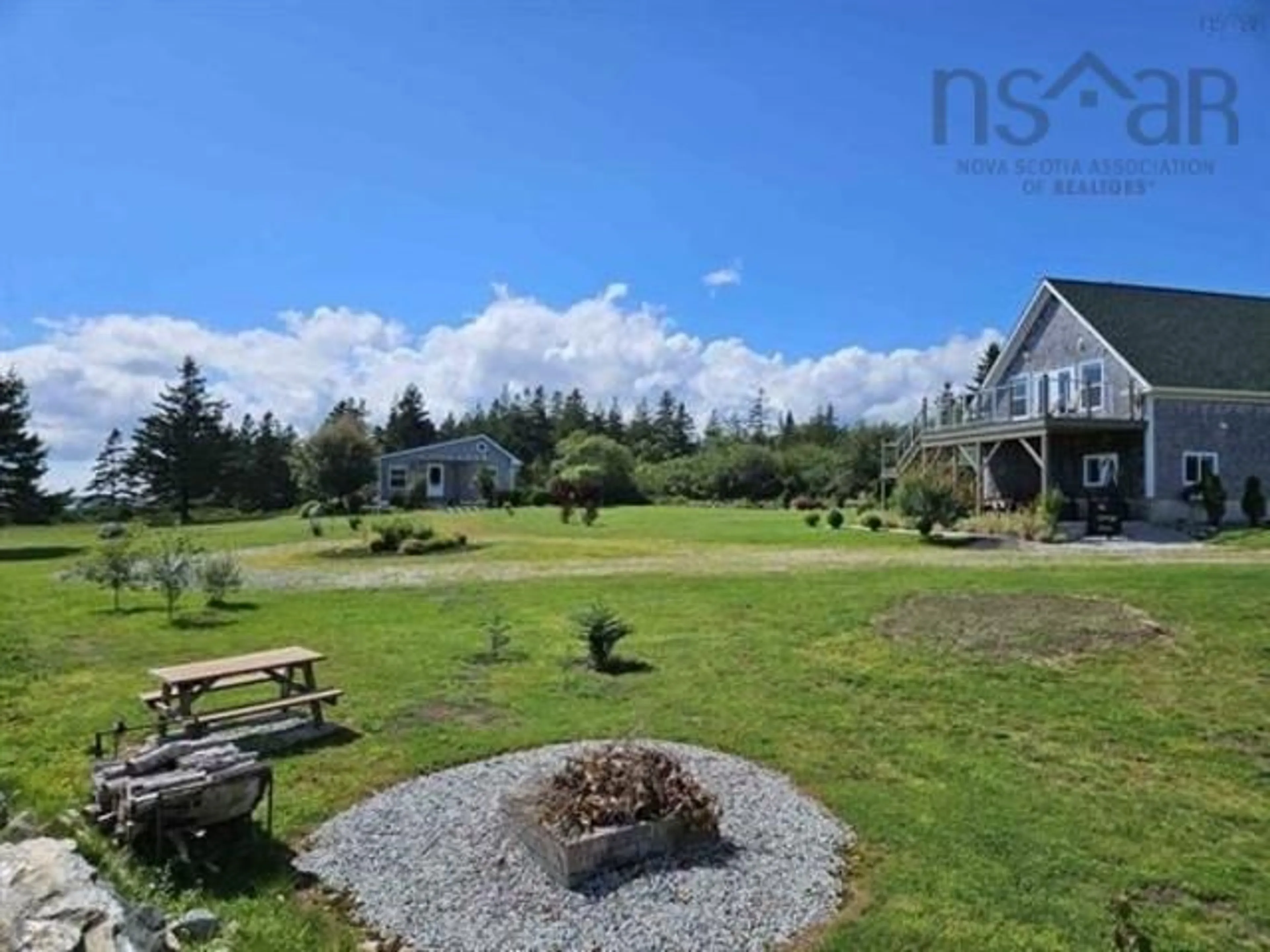 A pic from outside/outdoor area/front of a property/back of a property/a pic from drone, water/lake/river/ocean view for 2710 Sandy Point Rd, Sandy Point Nova Scotia B0T 1W0