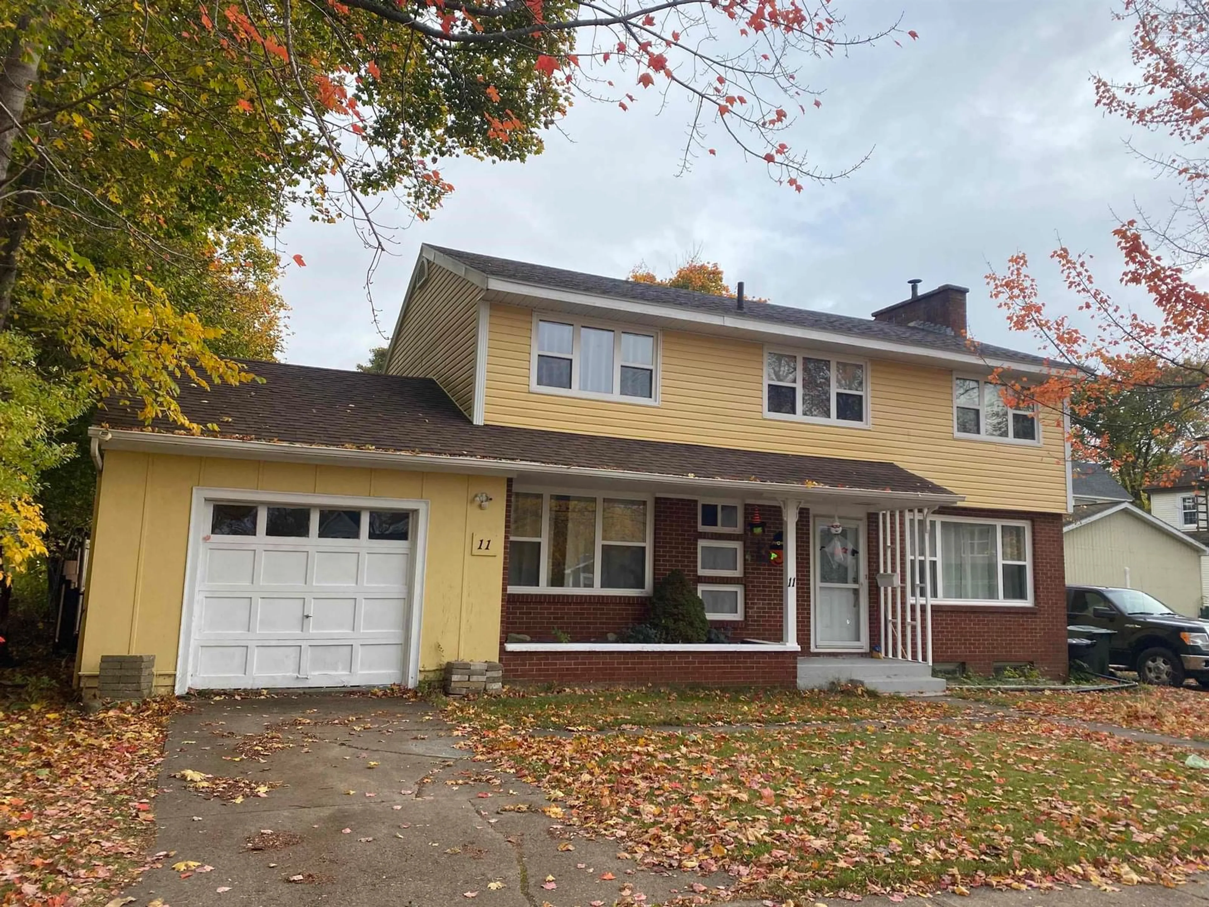 Home with vinyl exterior material, street for 11 Hospital Street, Sydney Nova Scotia B1P 2H5