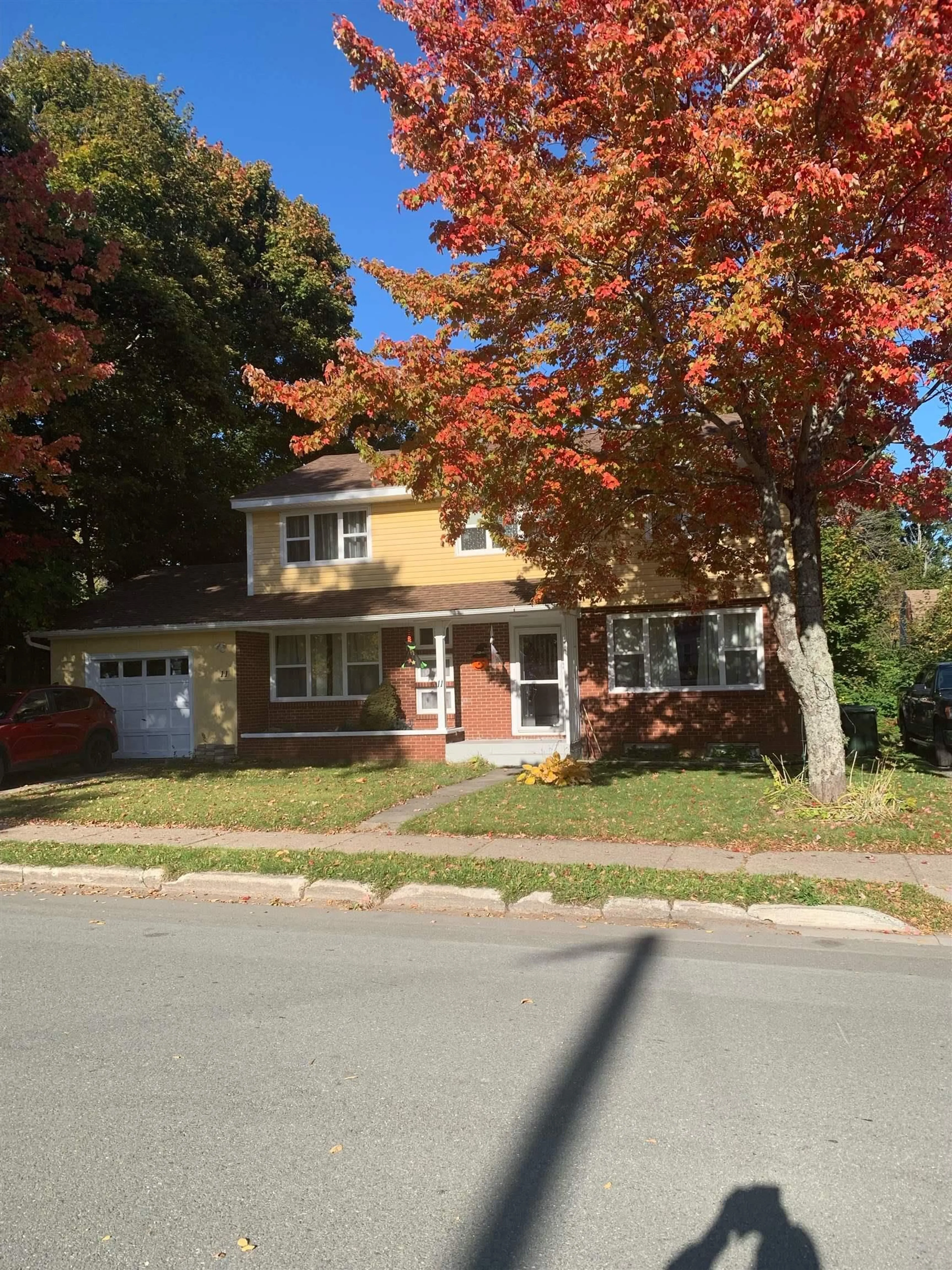 Home with vinyl exterior material, street for 11 Hospital Street, Sydney Nova Scotia B1P 2H5