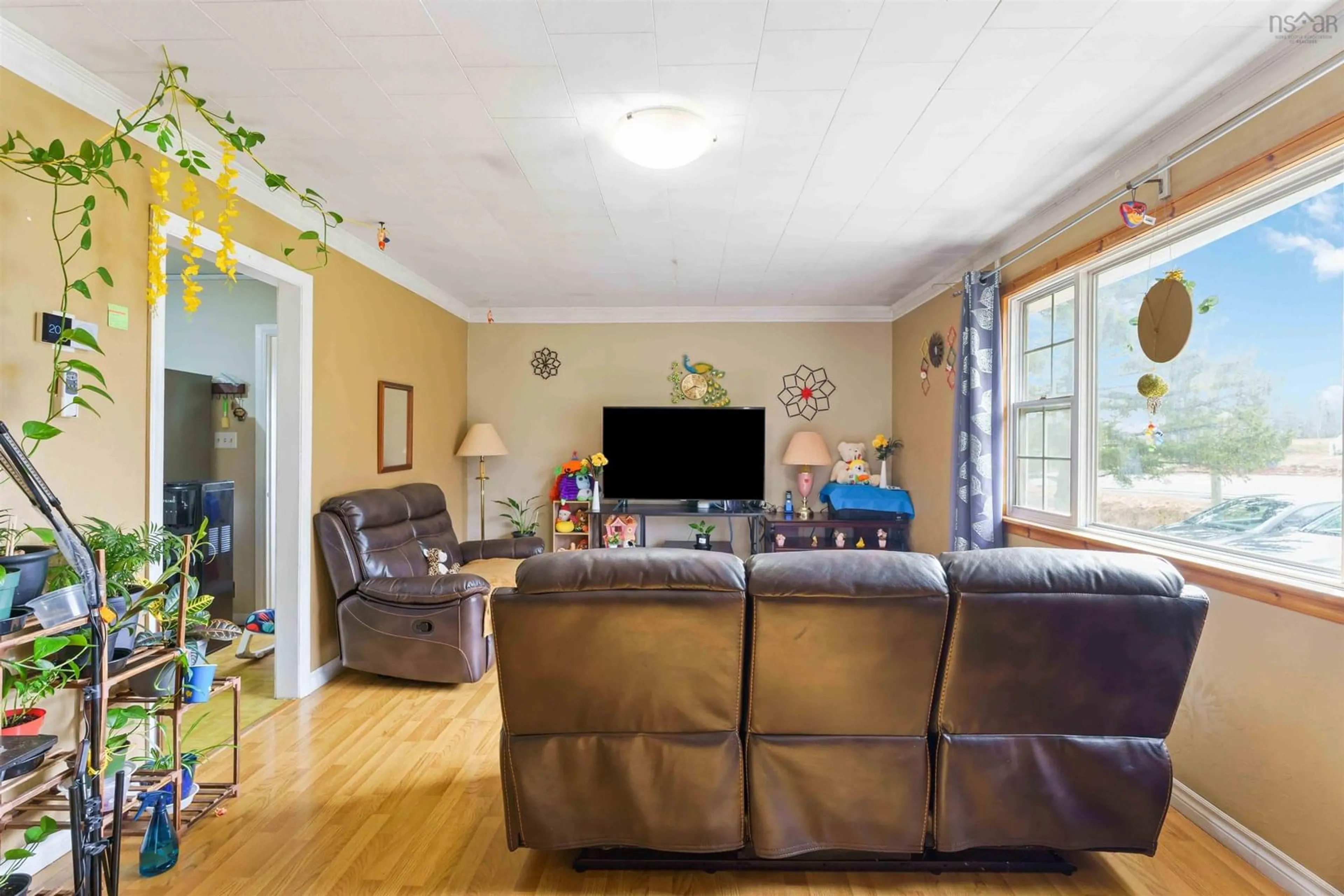 Living room with furniture, wood/laminate floor for 4637 Highway 12, North Alton Nova Scotia B4N 3V8