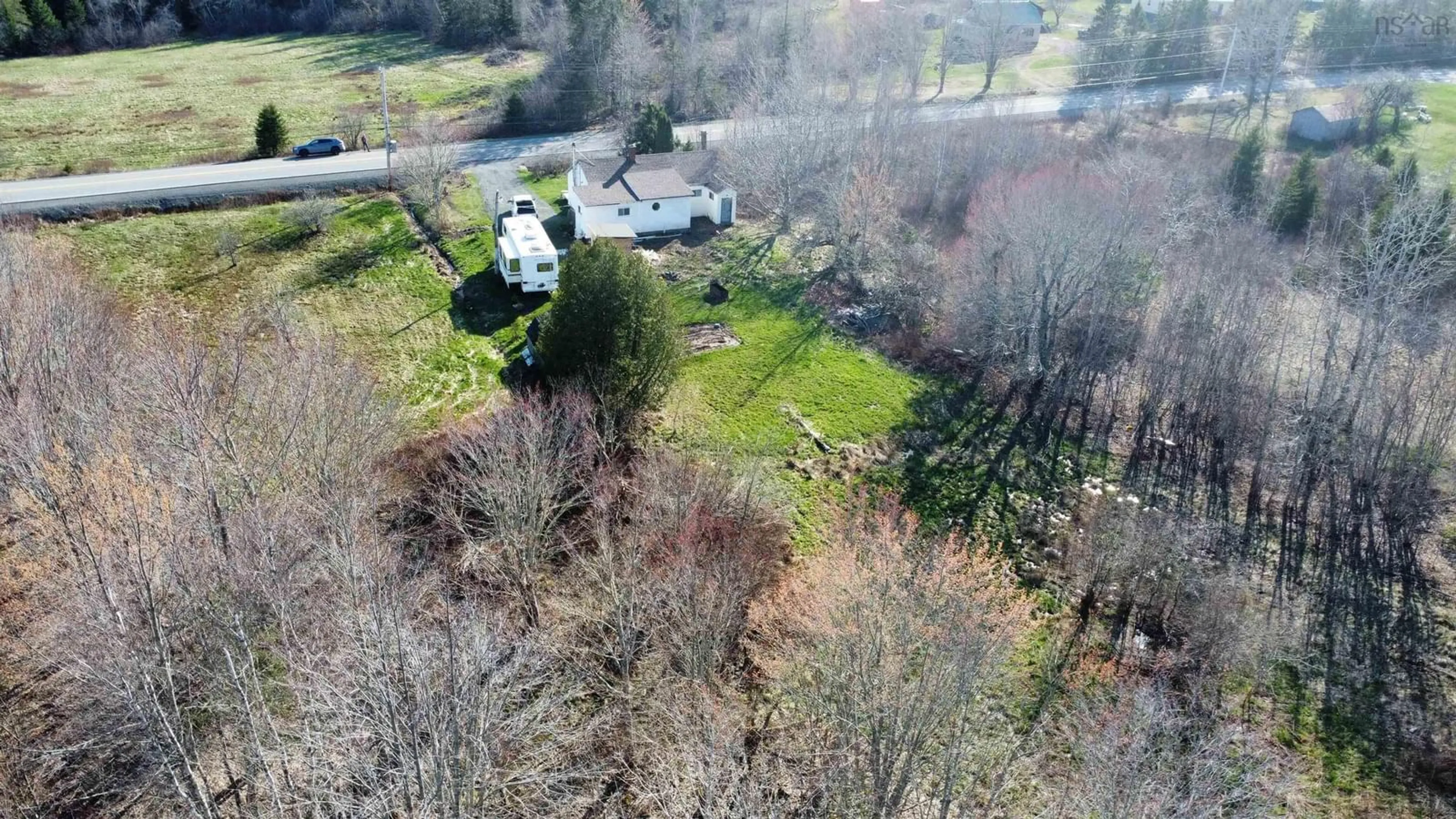 A pic from outside/outdoor area/front of a property/back of a property/a pic from drone, forest/trees view for 2873 Valley Rd, River Philip Nova Scotia B0M 1V0