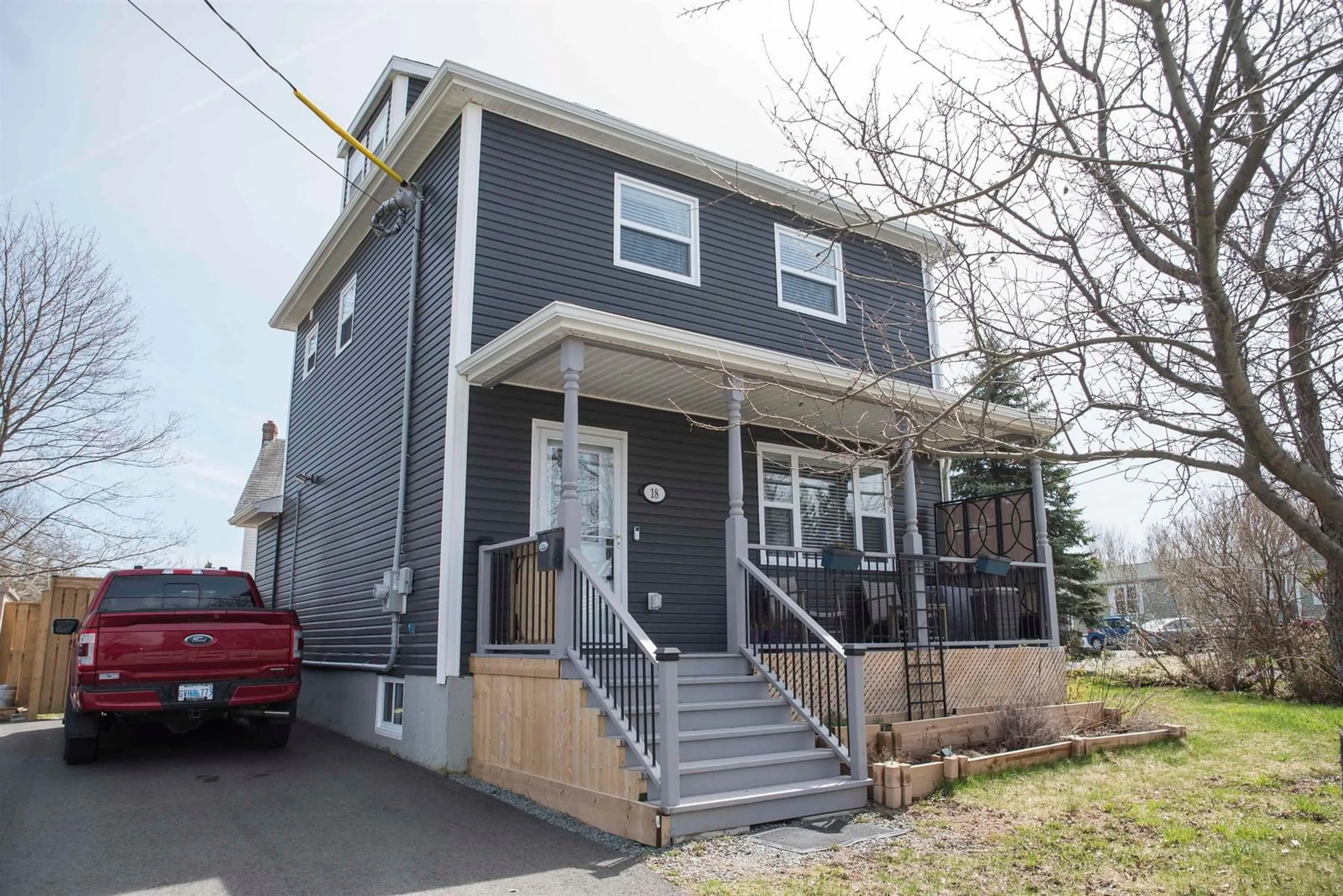 Home with vinyl exterior material, street for 18 Convent St, Sydney Mines Nova Scotia B1V 1J7