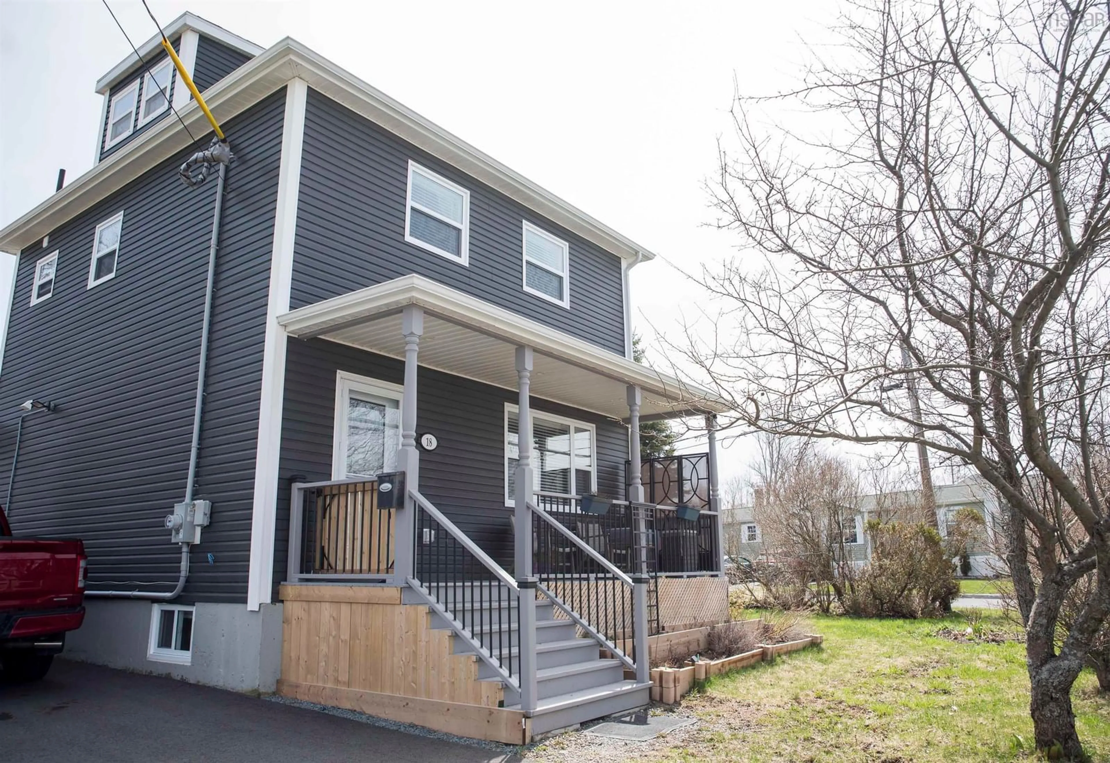Home with vinyl exterior material, street for 18 Convent St, Sydney Mines Nova Scotia B1V 1J7