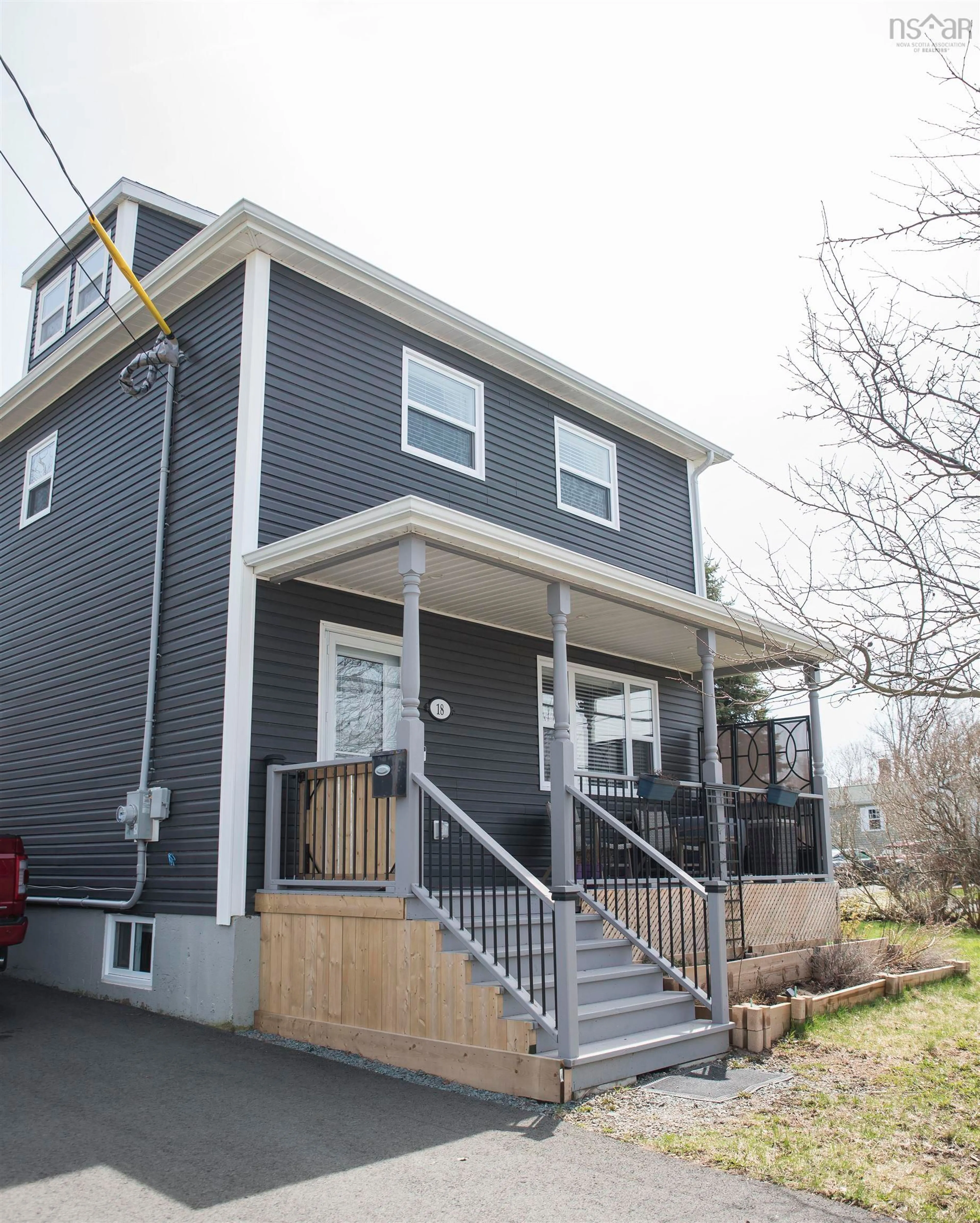 Home with vinyl exterior material, street for 18 Convent St, Sydney Mines Nova Scotia B1V 1J7