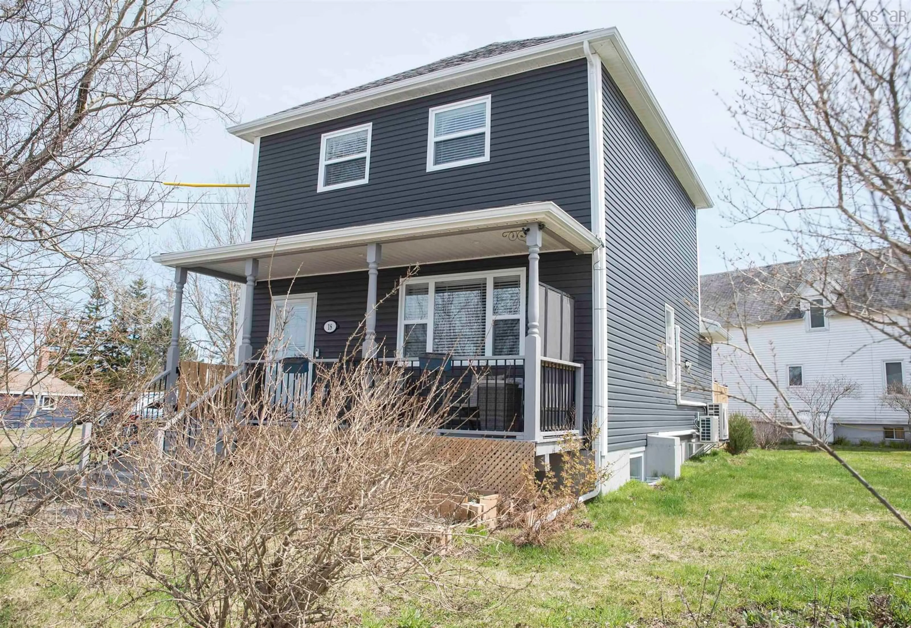 Home with vinyl exterior material, street for 18 Convent St, Sydney Mines Nova Scotia B1V 1J7
