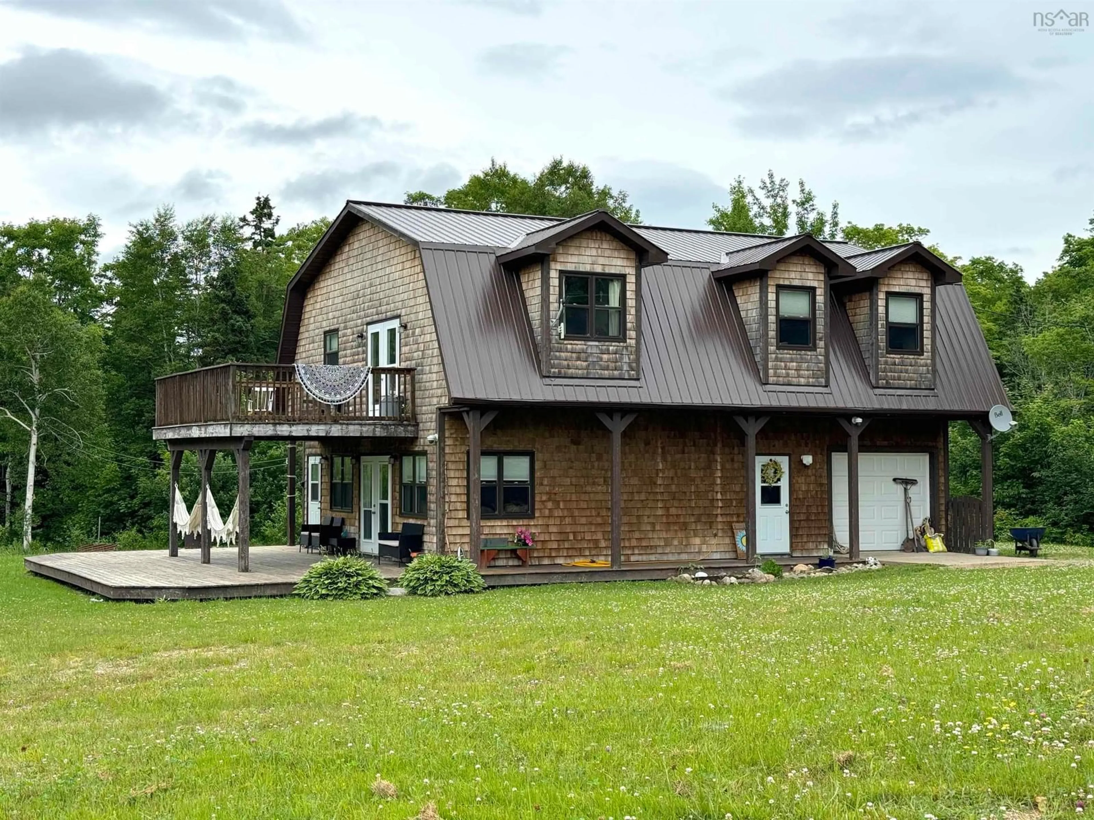 Home with vinyl exterior material, building for 27859 Cabot Trail, Cape North Nova Scotia B0C 1G0
