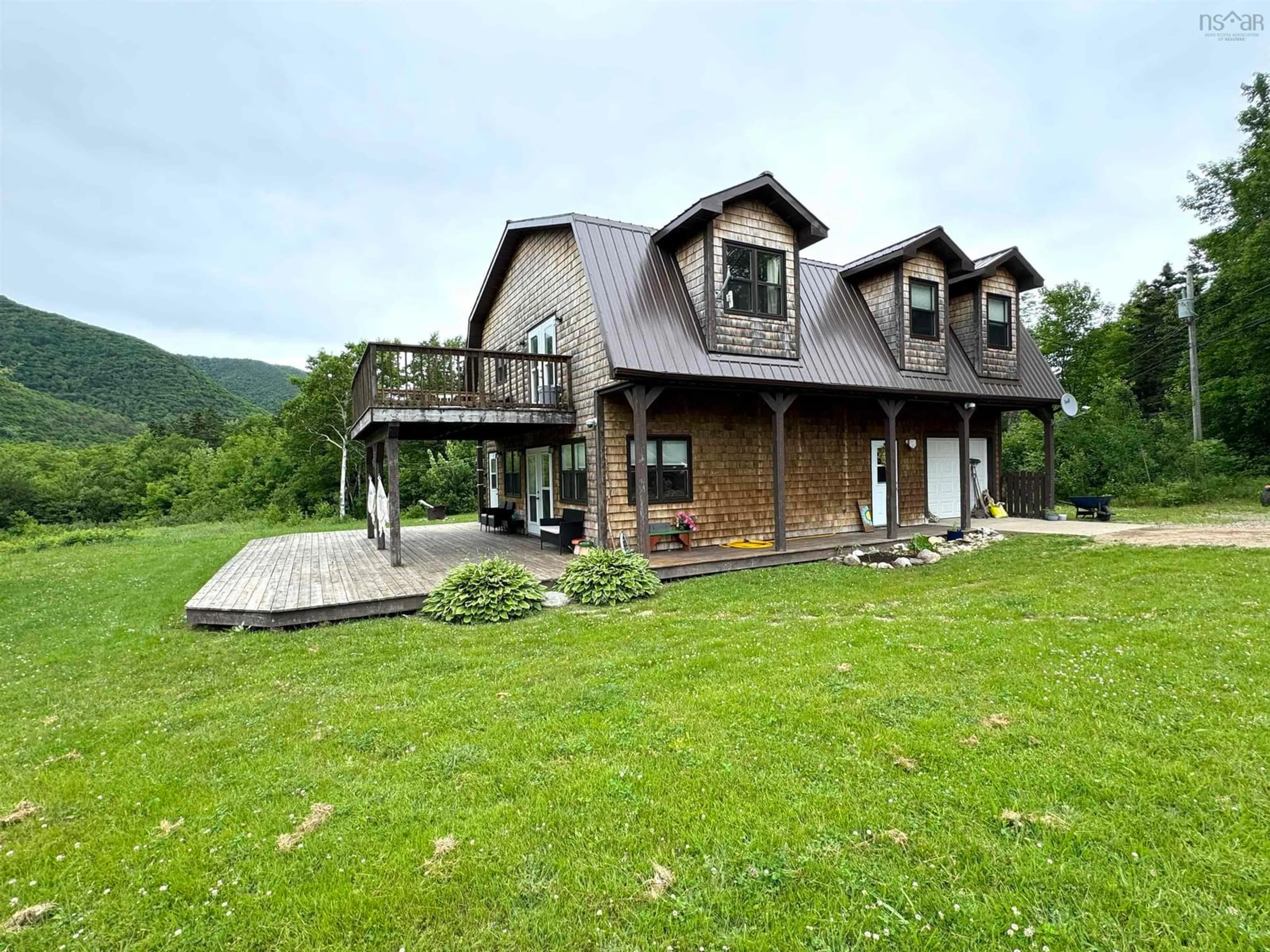 A pic from outside/outdoor area/front of a property/back of a property/a pic from drone, mountain view for 27859 Cabot Trail, Cape North Nova Scotia B0C 1G0