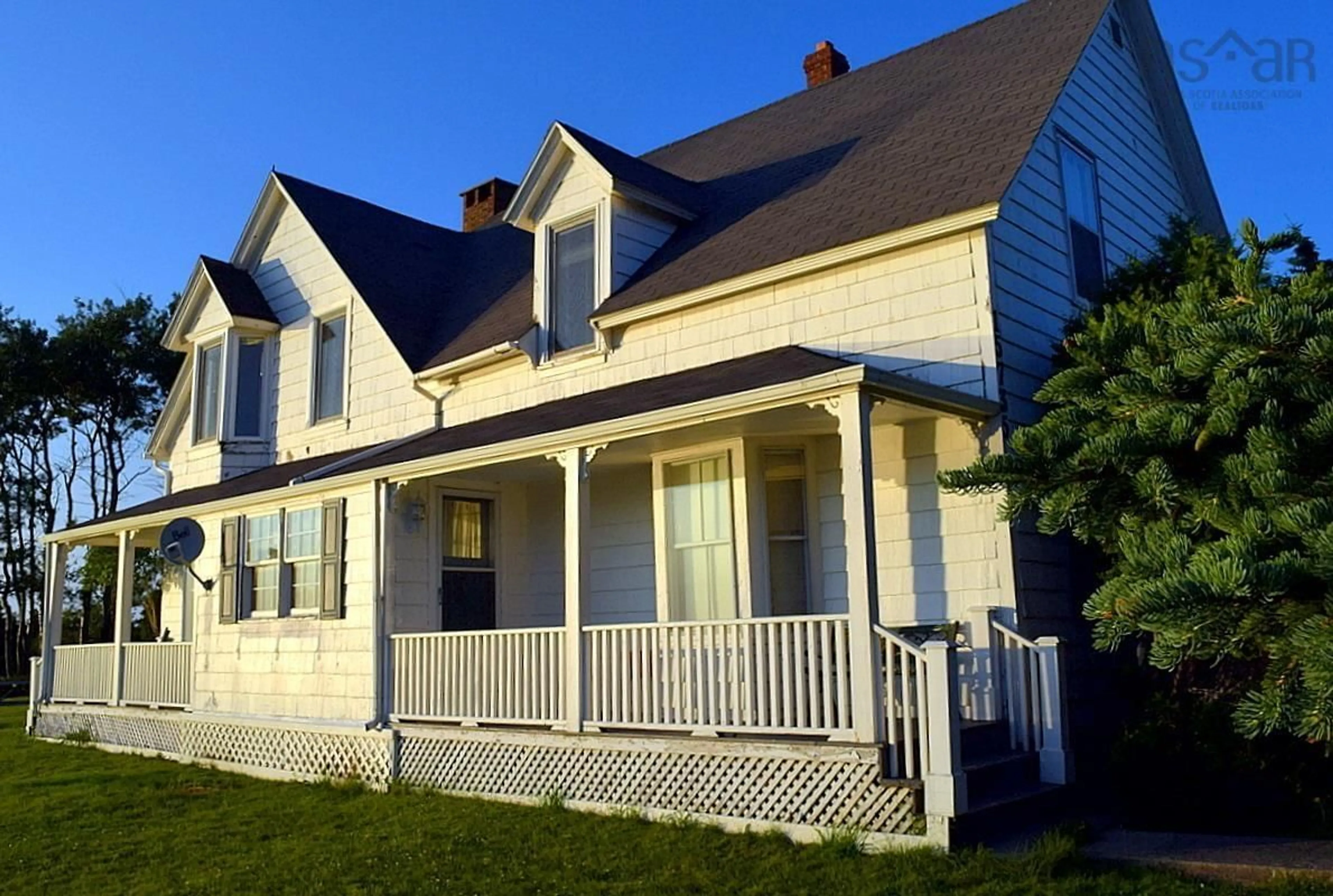Home with vinyl exterior material, street for 15735 Central Ave, Inverness Nova Scotia B0E 1N0