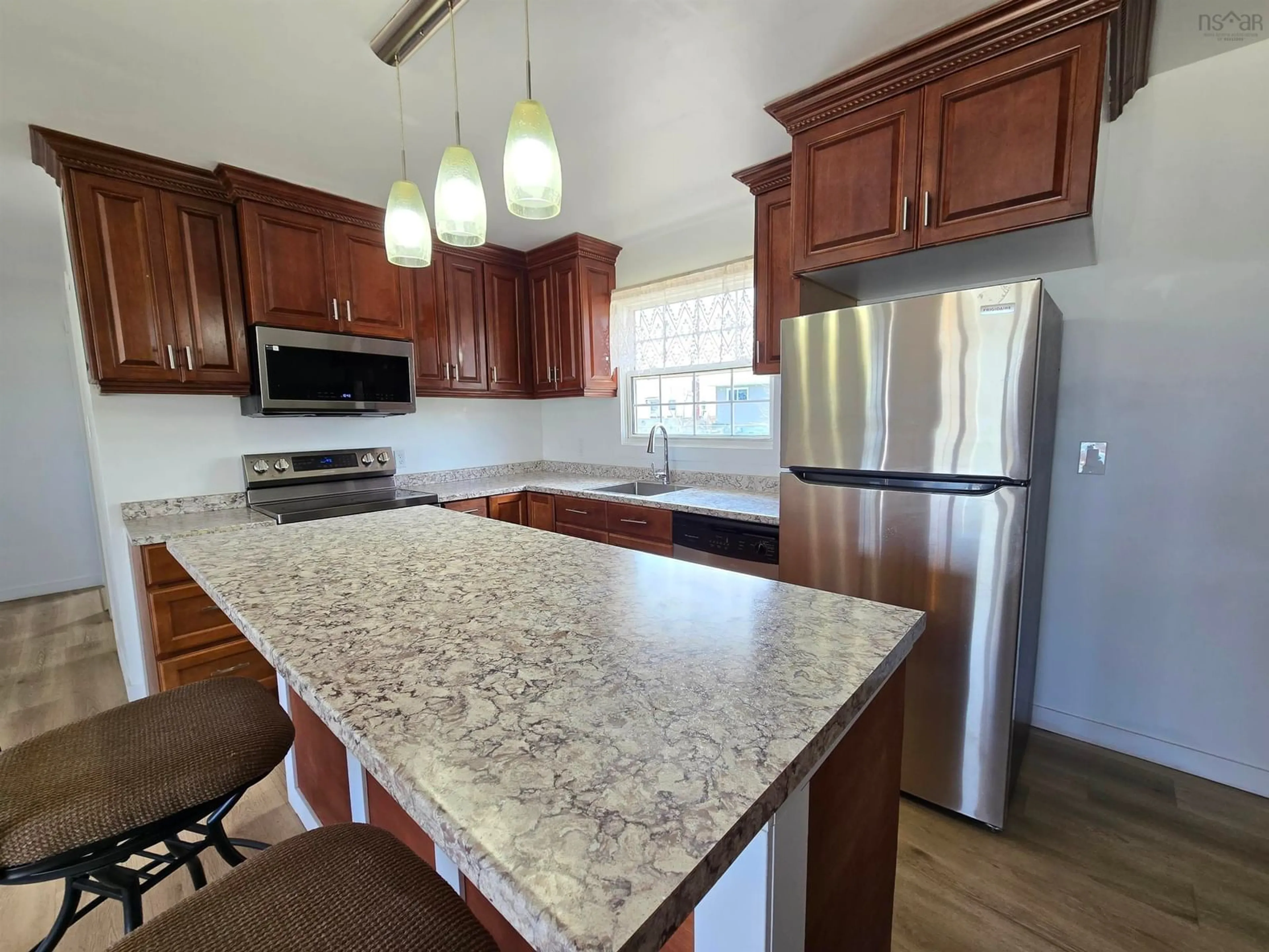 Open concept kitchen, ceramic/tile floor for 268 Gatacre St, Sydney Nova Scotia B1N 1Z5