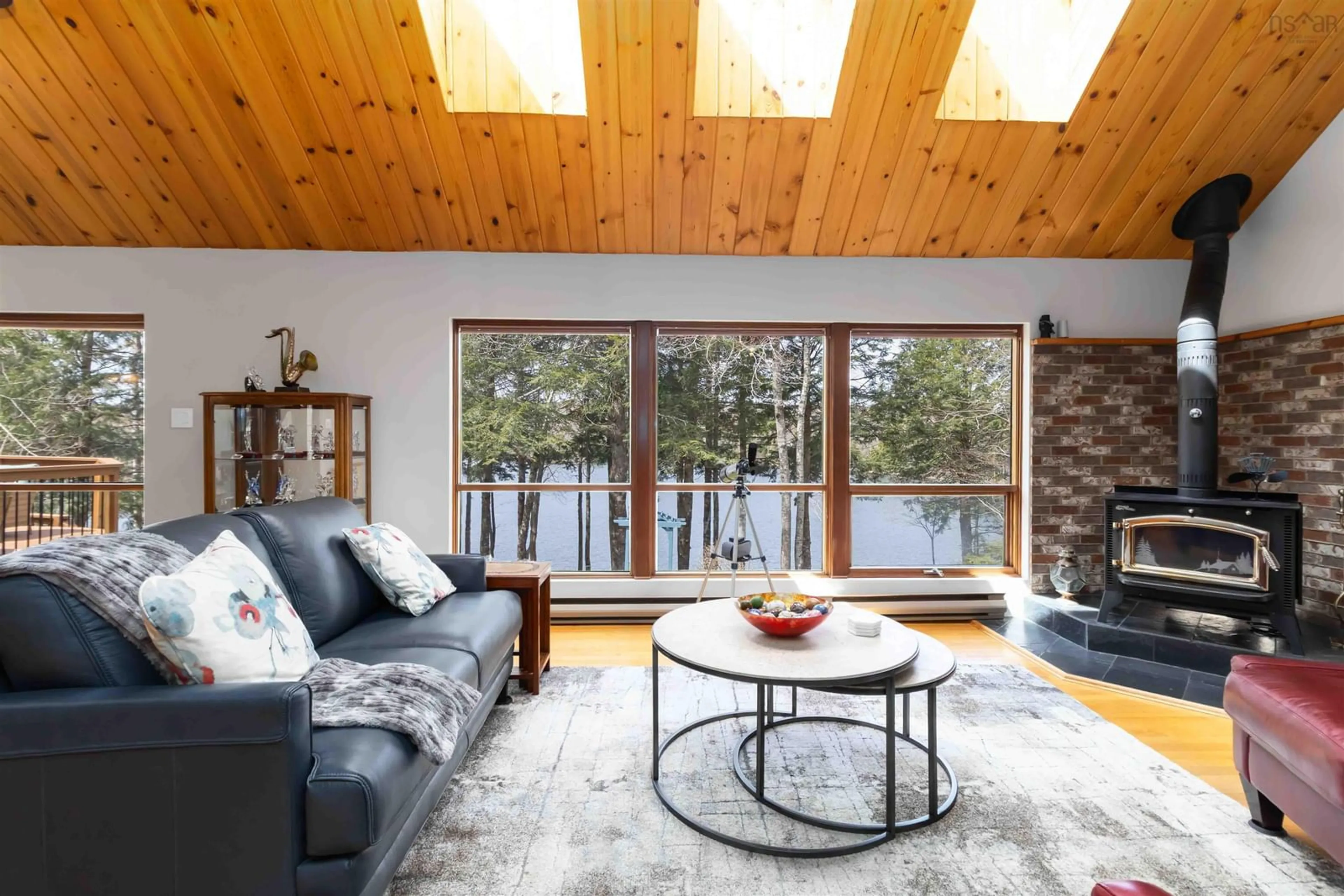 Living room with furniture, wood/laminate floor for 82 Southwood Rd, Hammonds Plains Nova Scotia B3Z 1K5
