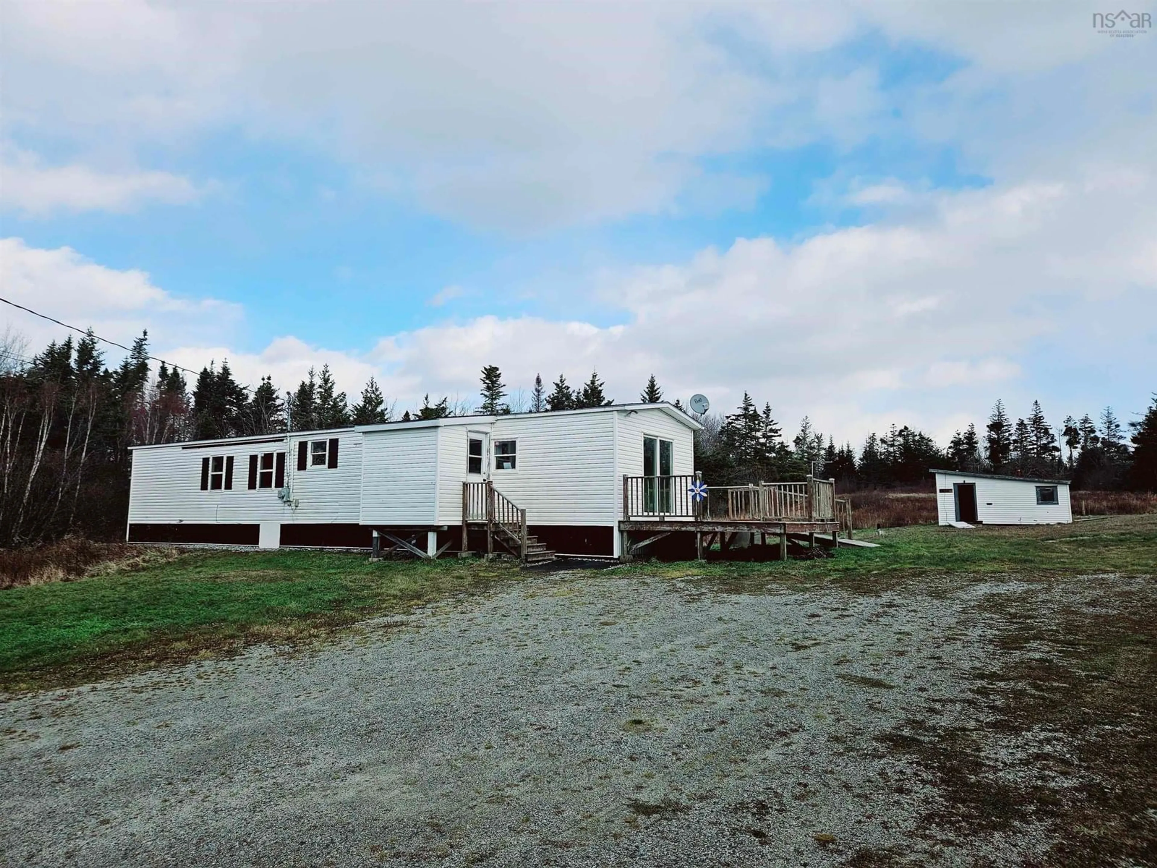A pic from outside/outdoor area/front of a property/back of a property/a pic from drone, building for 1863 Sandy Point Rd, Sandy Point Nova Scotia B0T 1W0