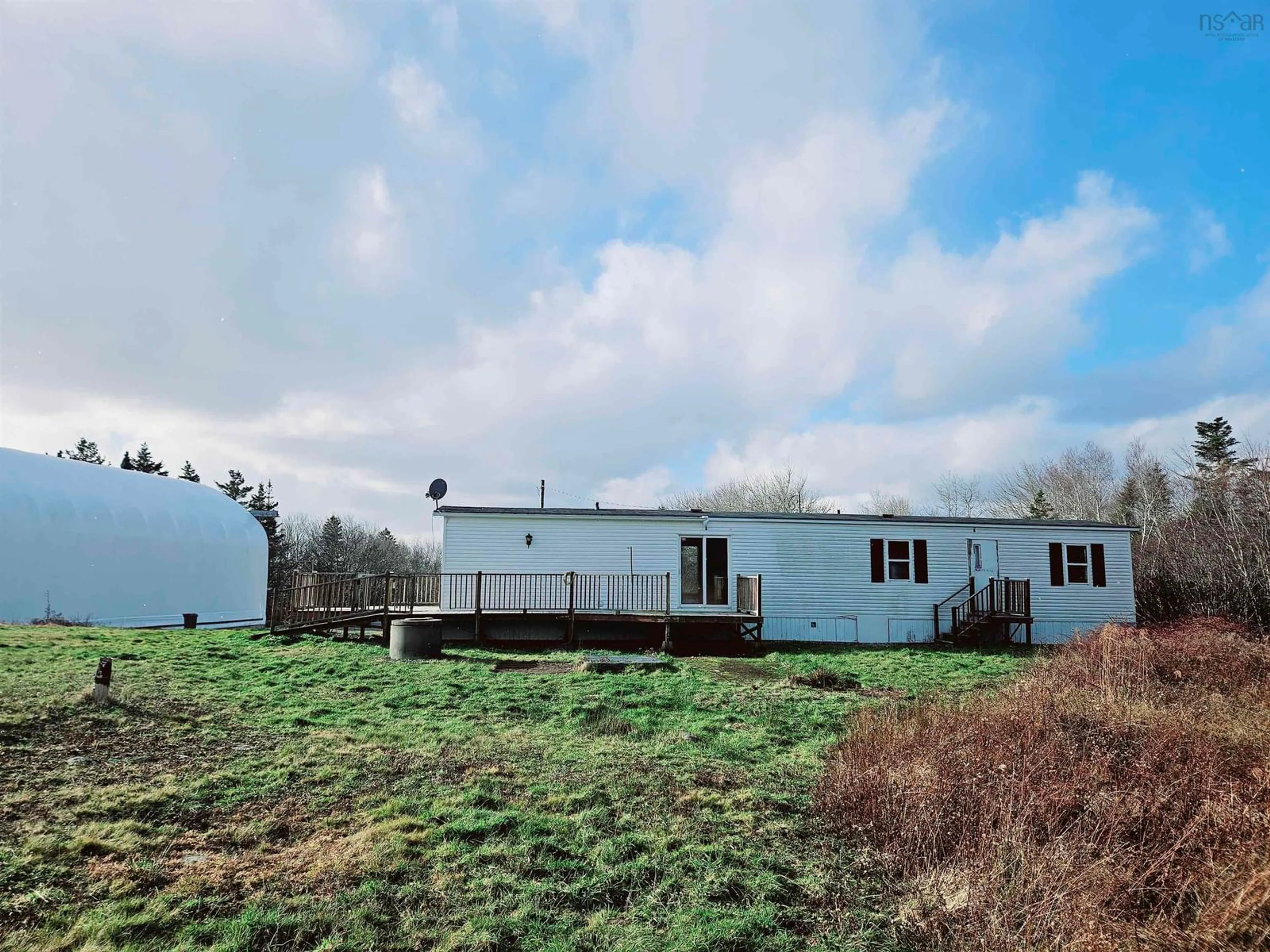 A pic from outside/outdoor area/front of a property/back of a property/a pic from drone, building for 1863 Sandy Point Rd, Sandy Point Nova Scotia B0T 1W0