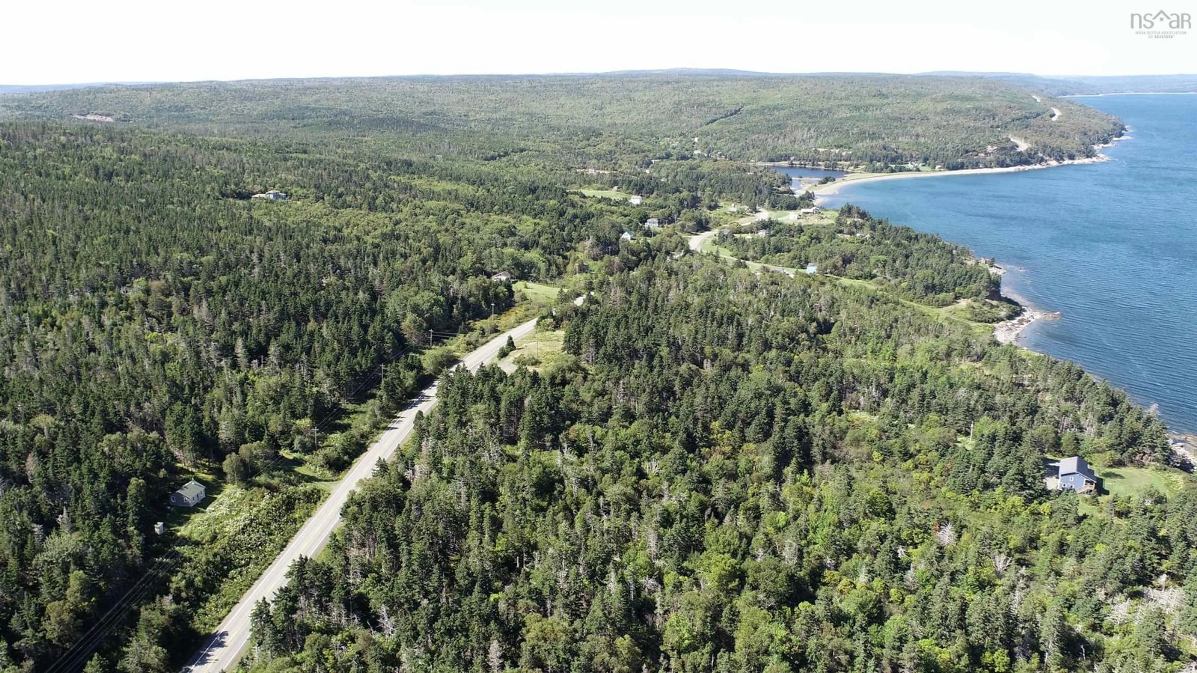 A pic from outside/outdoor area/front of a property/back of a property/a pic from drone, forest/trees view for 6989 Highway 16, Halfway Cove Nova Scotia B0H 1N0