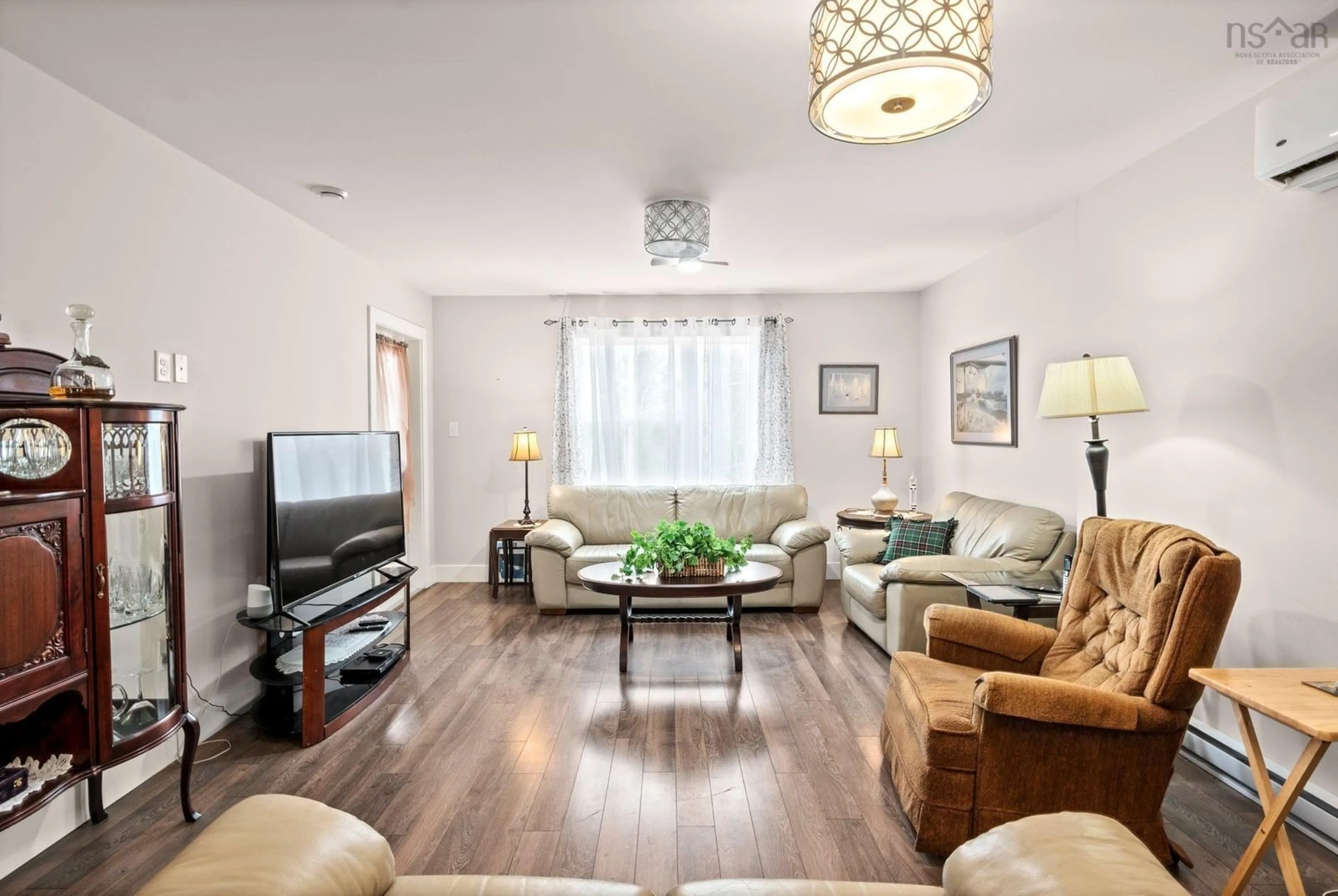 Living room with furniture, wood/laminate floor for 76 Crossfield Ridge, Middle Sackville Nova Scotia B4E 0N2