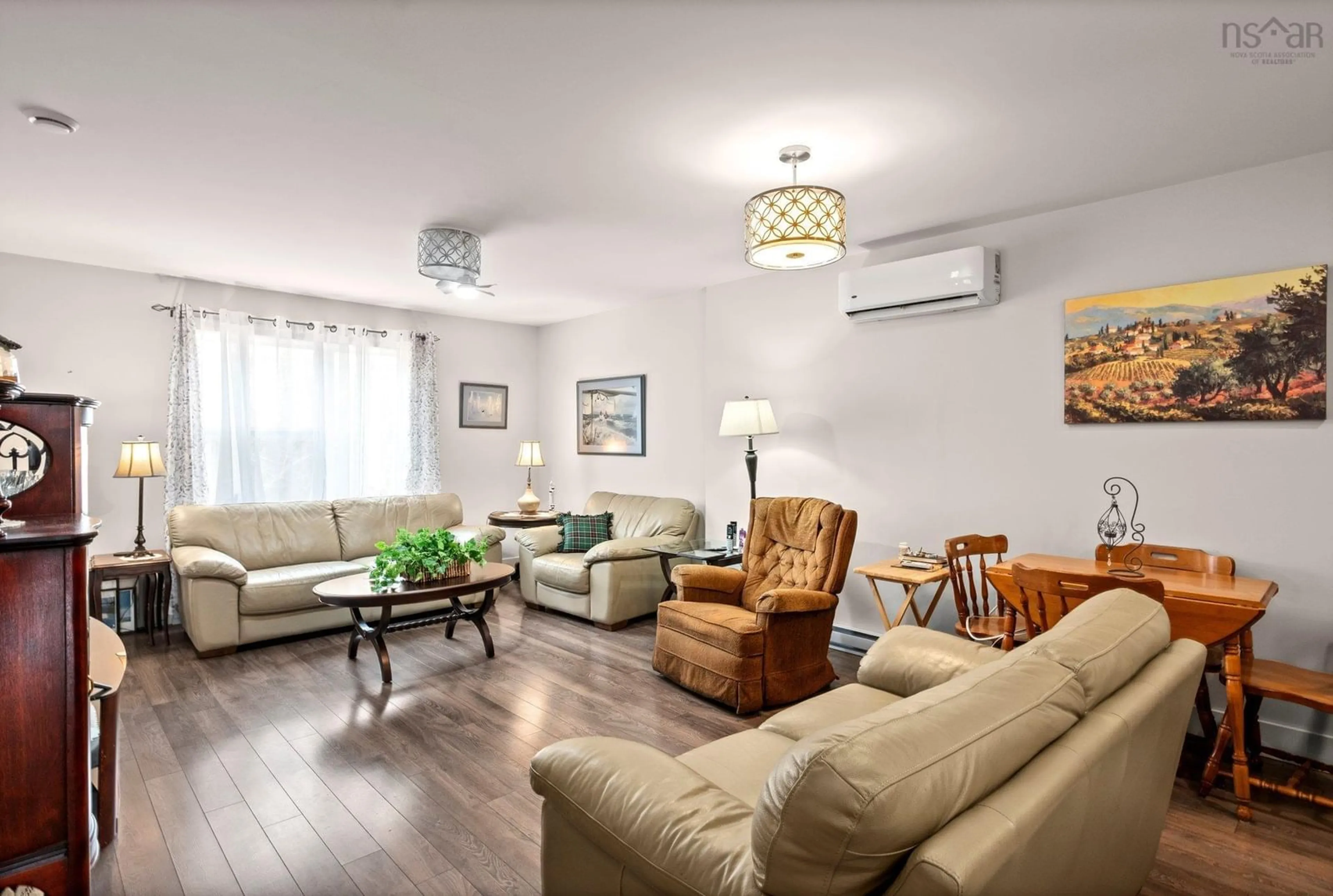 Living room with furniture, wood/laminate floor for 76 Crossfield Ridge, Middle Sackville Nova Scotia B4E 0N2