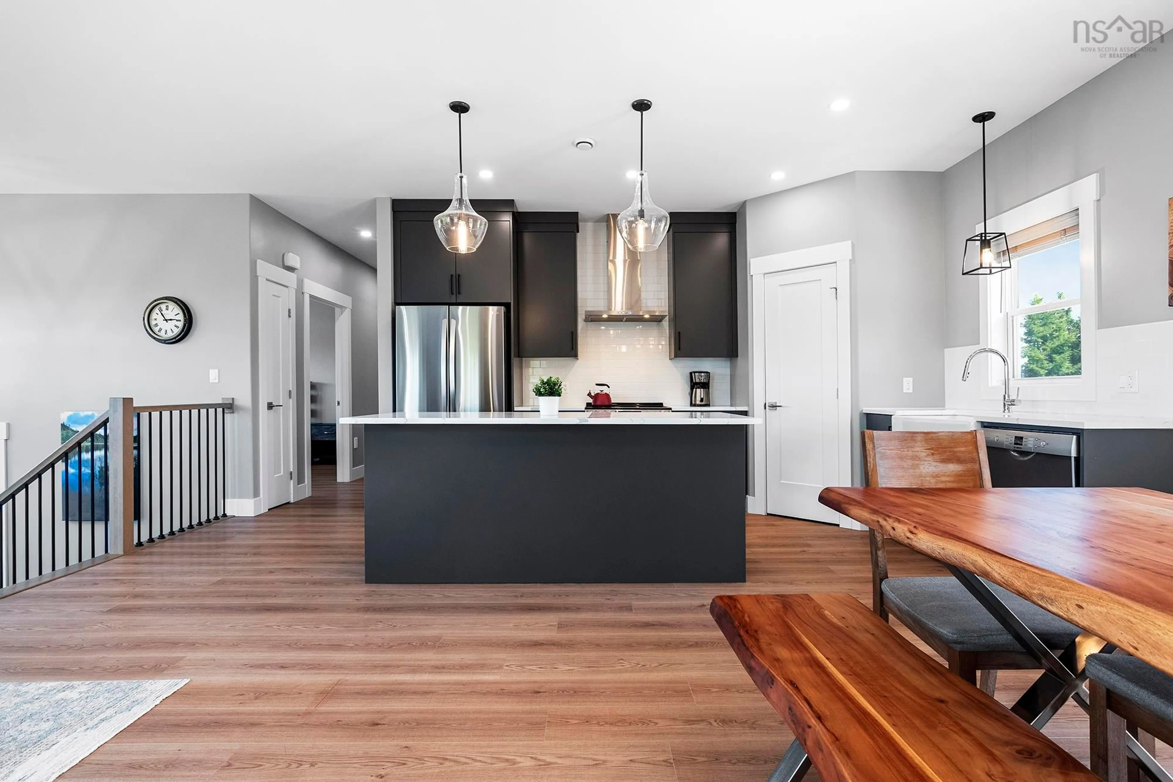 Open concept kitchen, wood/laminate floor for 114 Wright Lake Run, Upper Tantallon Nova Scotia B3Z 0B2