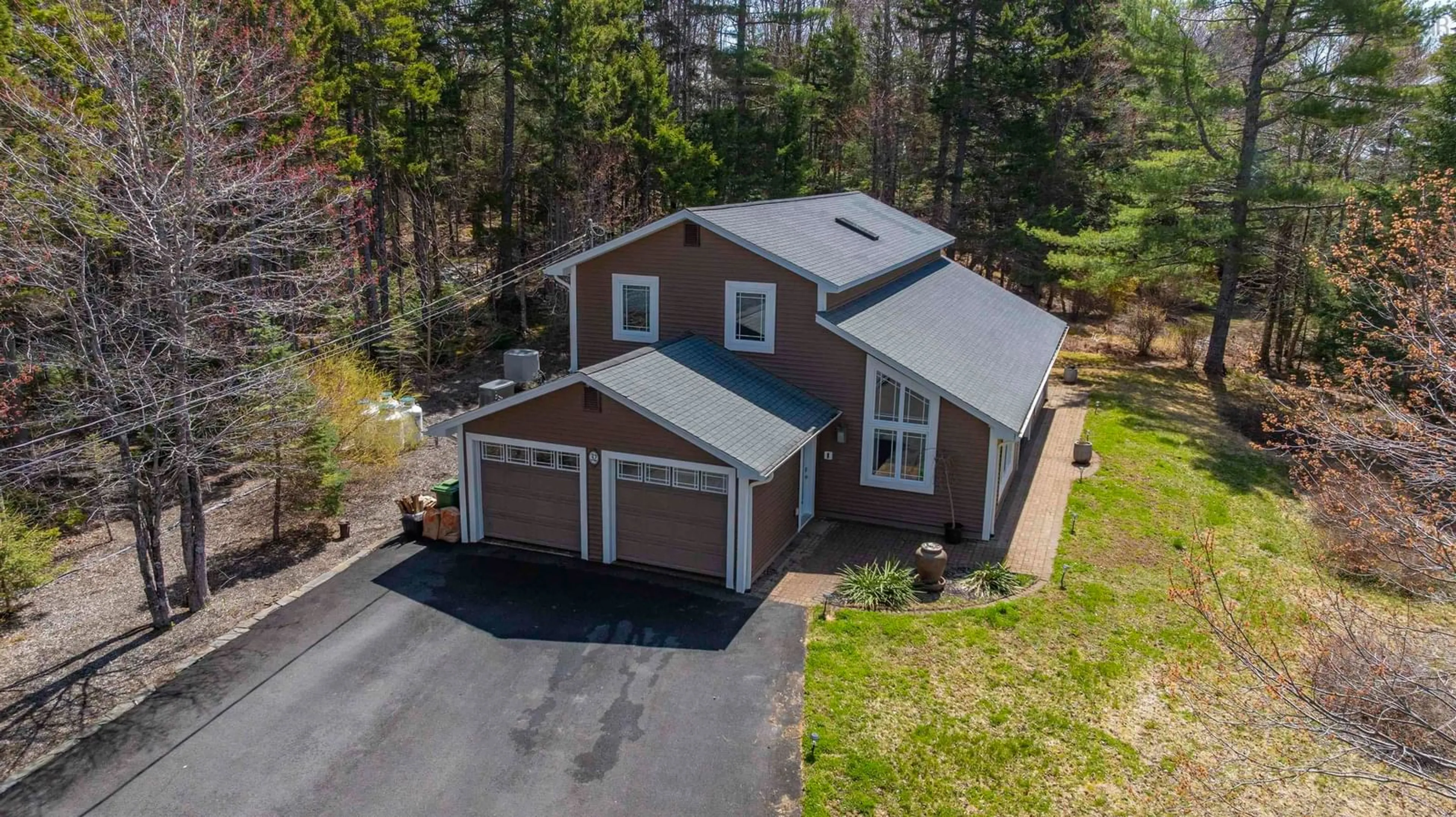 A pic from outside/outdoor area/front of a property/back of a property/a pic from drone, street for 32 Lakeland St, Beaver Bank Nova Scotia B4G 1A5