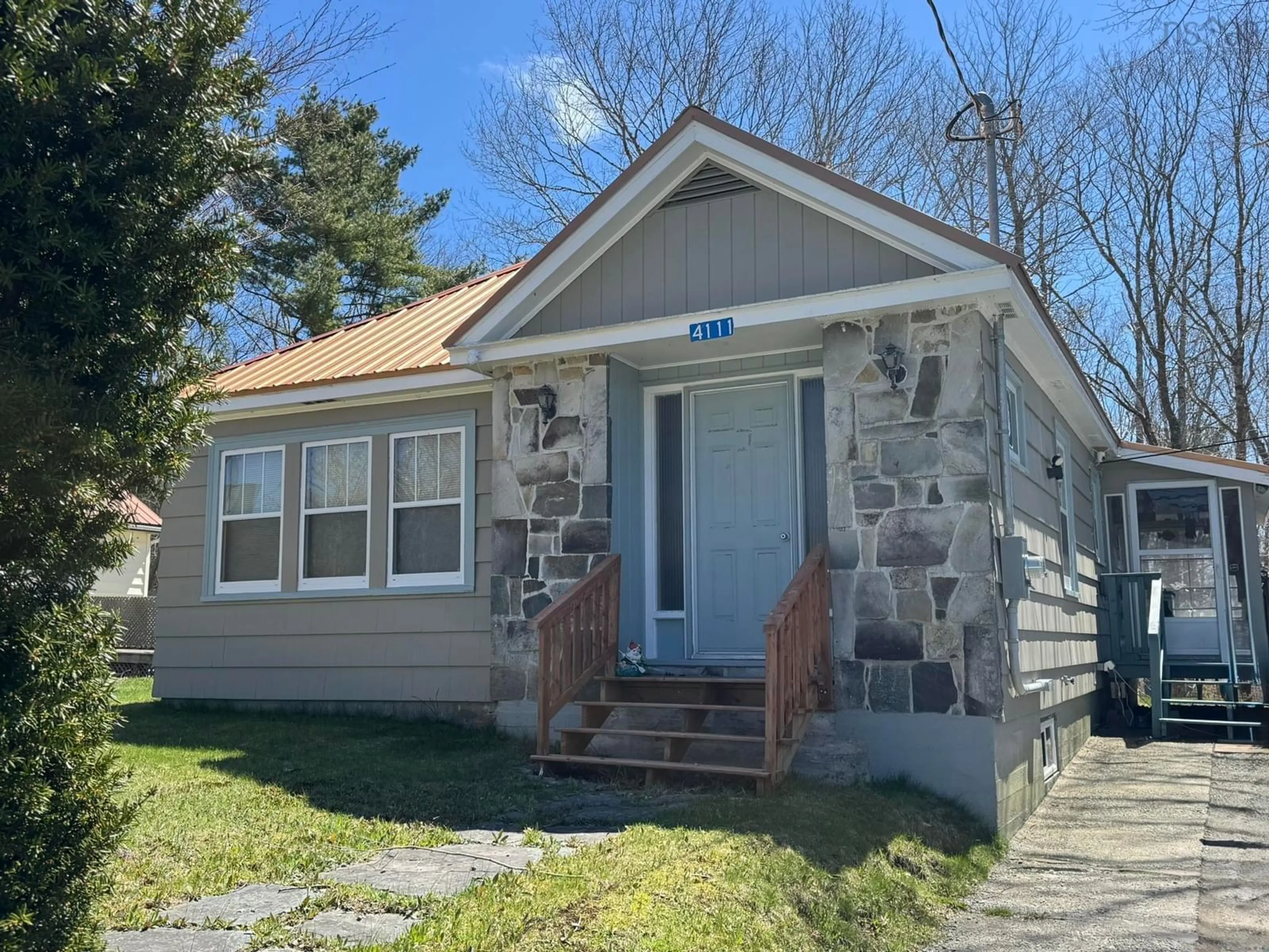Home with vinyl exterior material, street for 4111 Highway 3, Brooklyn Nova Scotia B0J 1H0