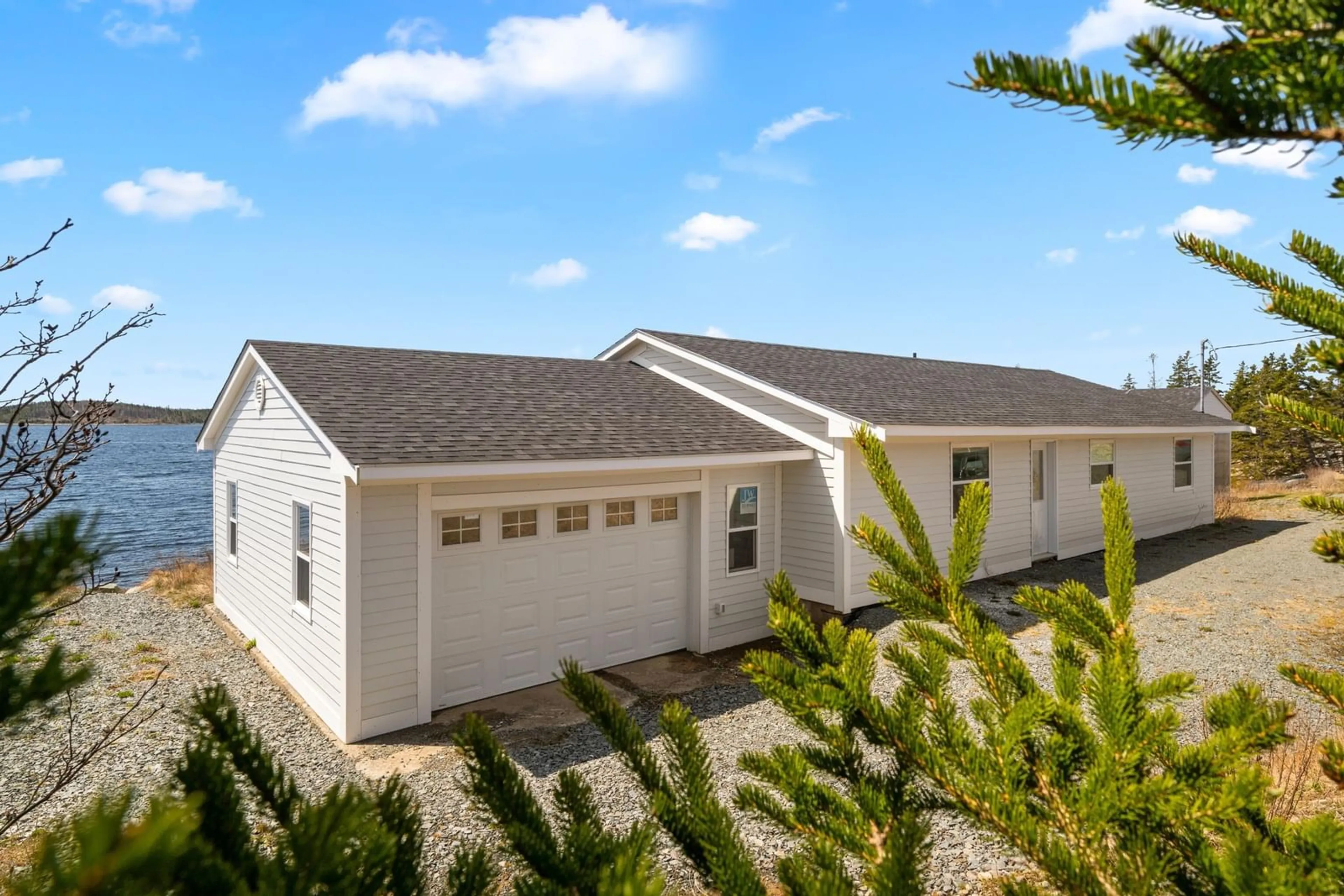 Home with vinyl exterior material, street for 24986 Nova Scotia Trunk 7, Port Dufferin Nova Scotia B0K 2R0