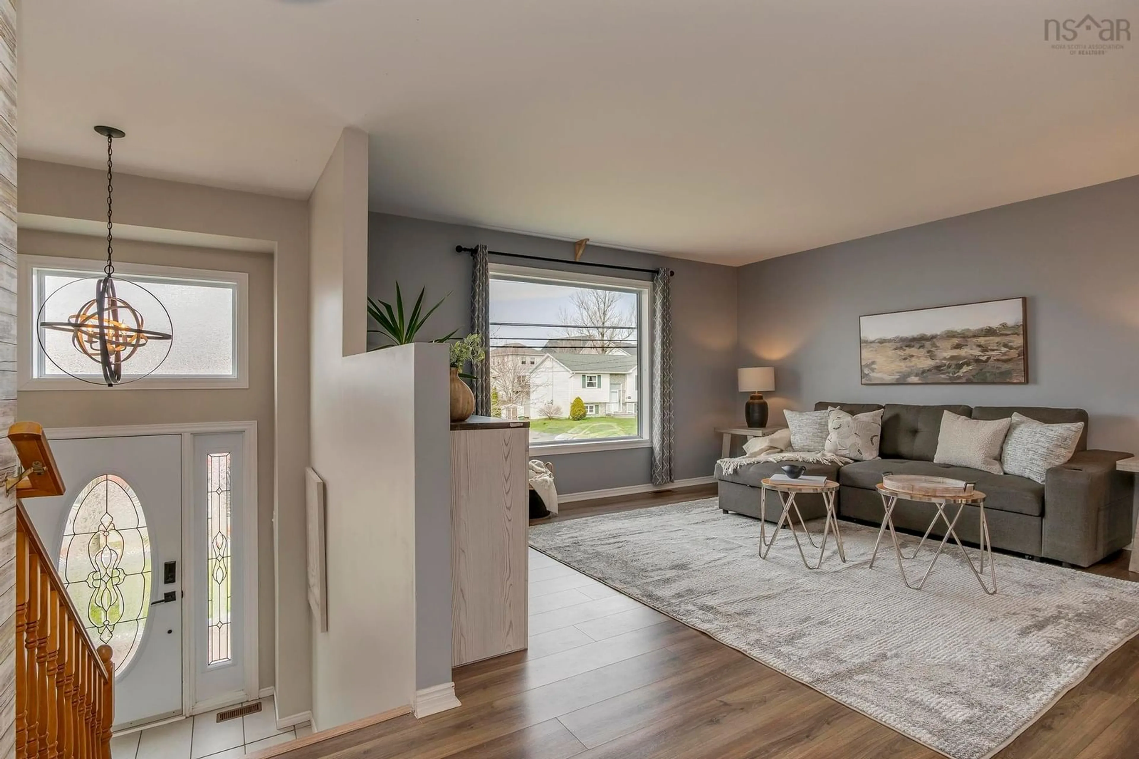 Living room with furniture, wood/laminate floor for 518 Caldwell Rd, Cole Harbour Nova Scotia B2V 1A6