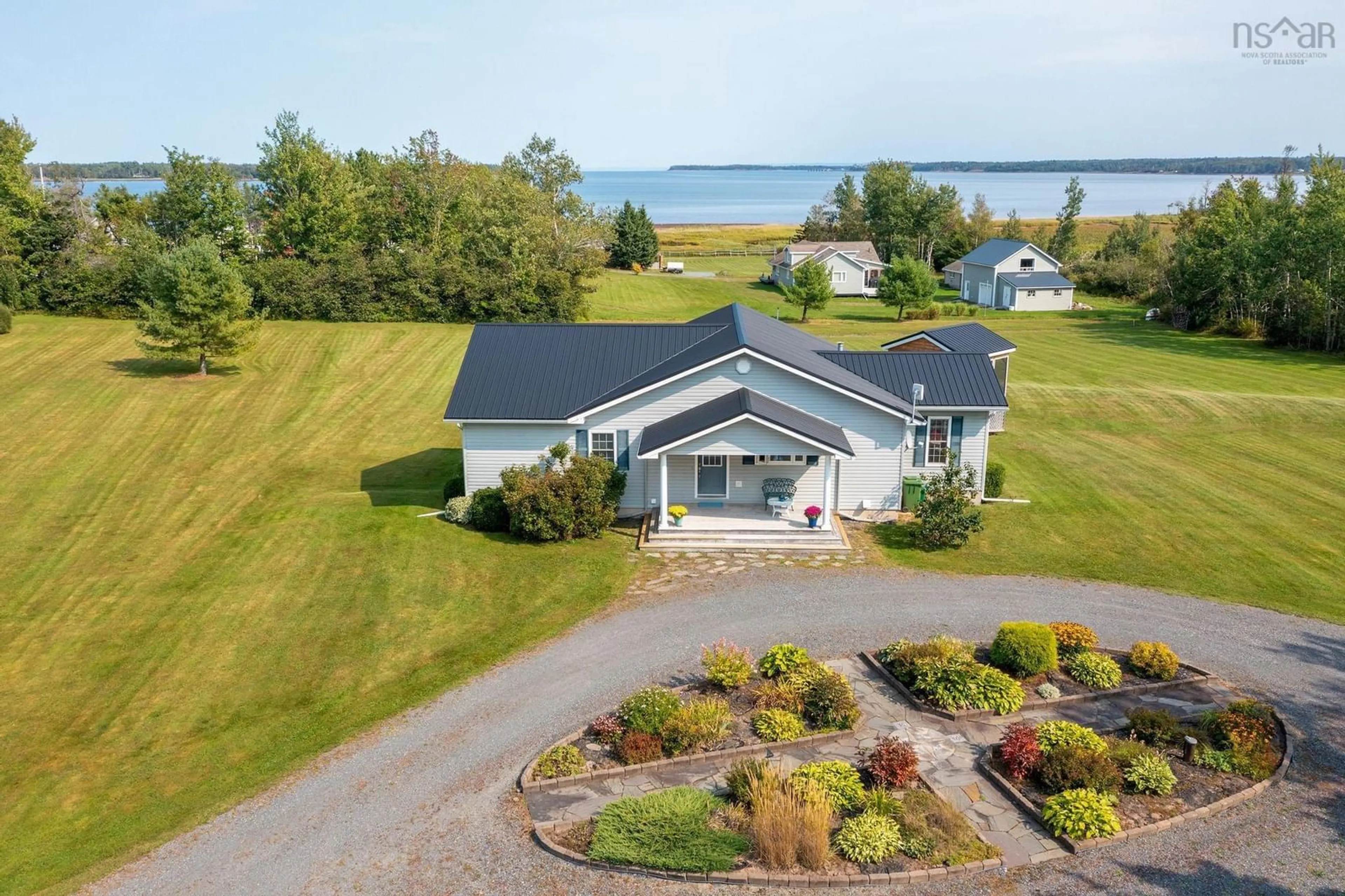 A pic from outside/outdoor area/front of a property/back of a property/a pic from drone, water/lake/river/ocean view for 70 Davidson Lane, Waterside Nova Scotia B0K 1H0