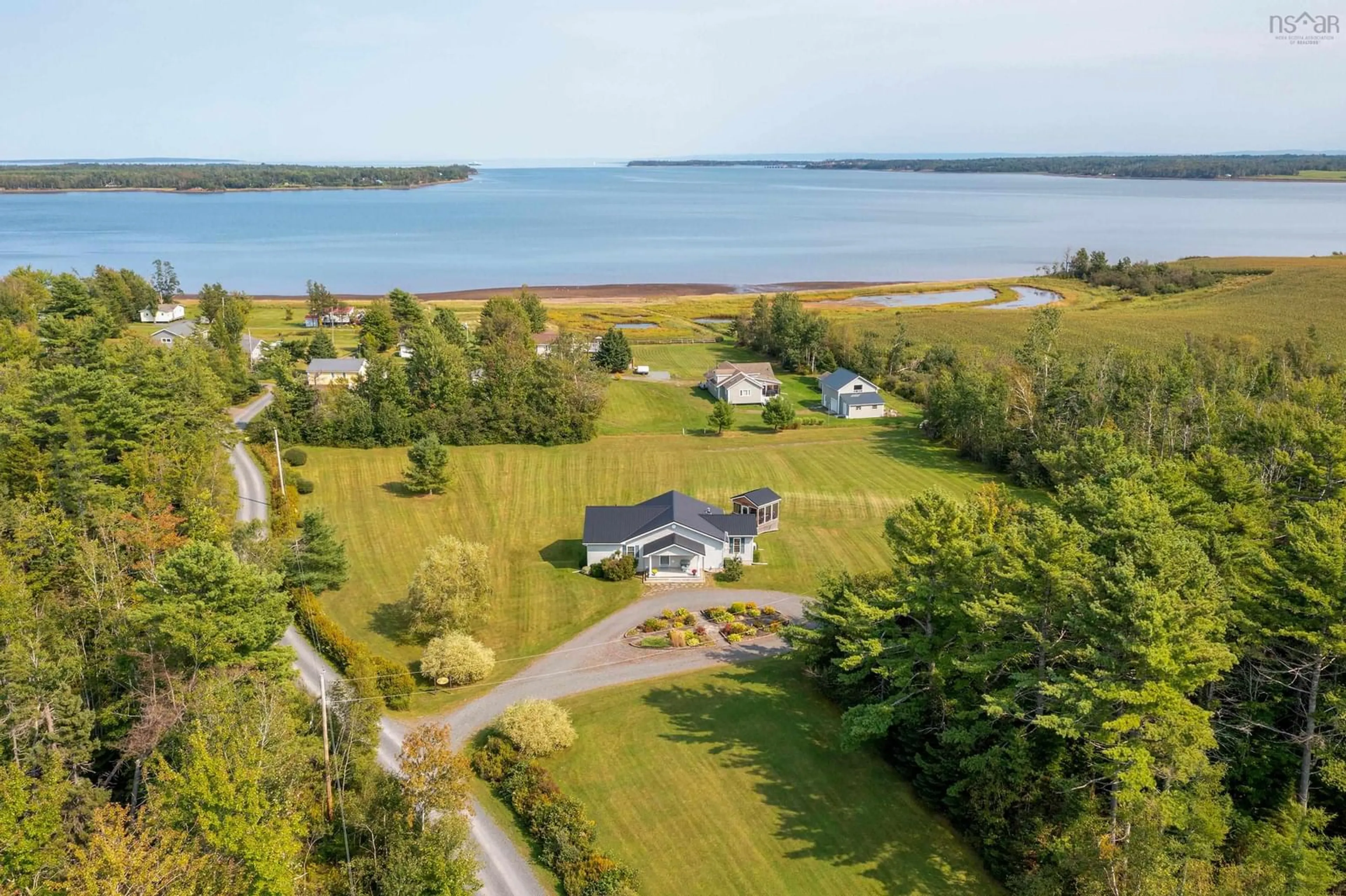 A pic from outside/outdoor area/front of a property/back of a property/a pic from drone, water/lake/river/ocean view for 70 Davidson Lane, Waterside Nova Scotia B0K 1H0