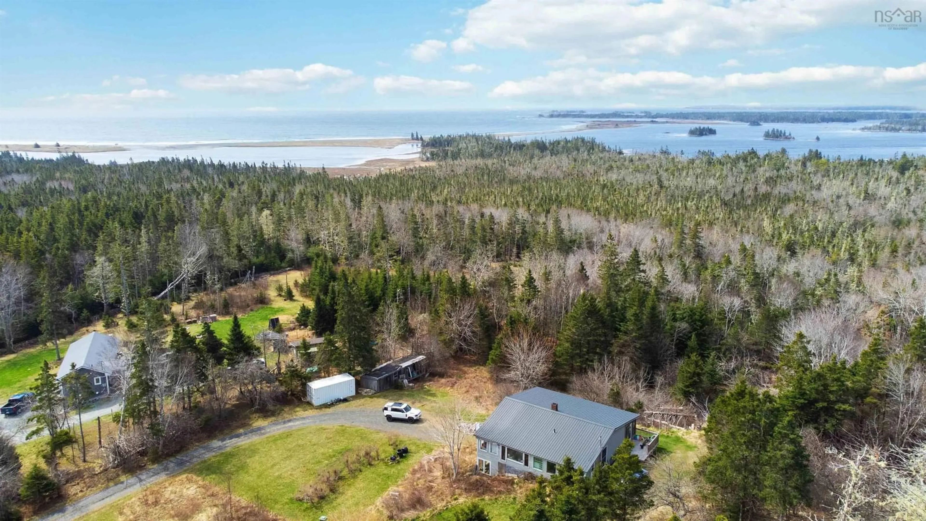 A pic from outside/outdoor area/front of a property/back of a property/a pic from drone, water/lake/river/ocean view for 8169 Highway 331, Cherry Hill Nova Scotia B0J 2H0
