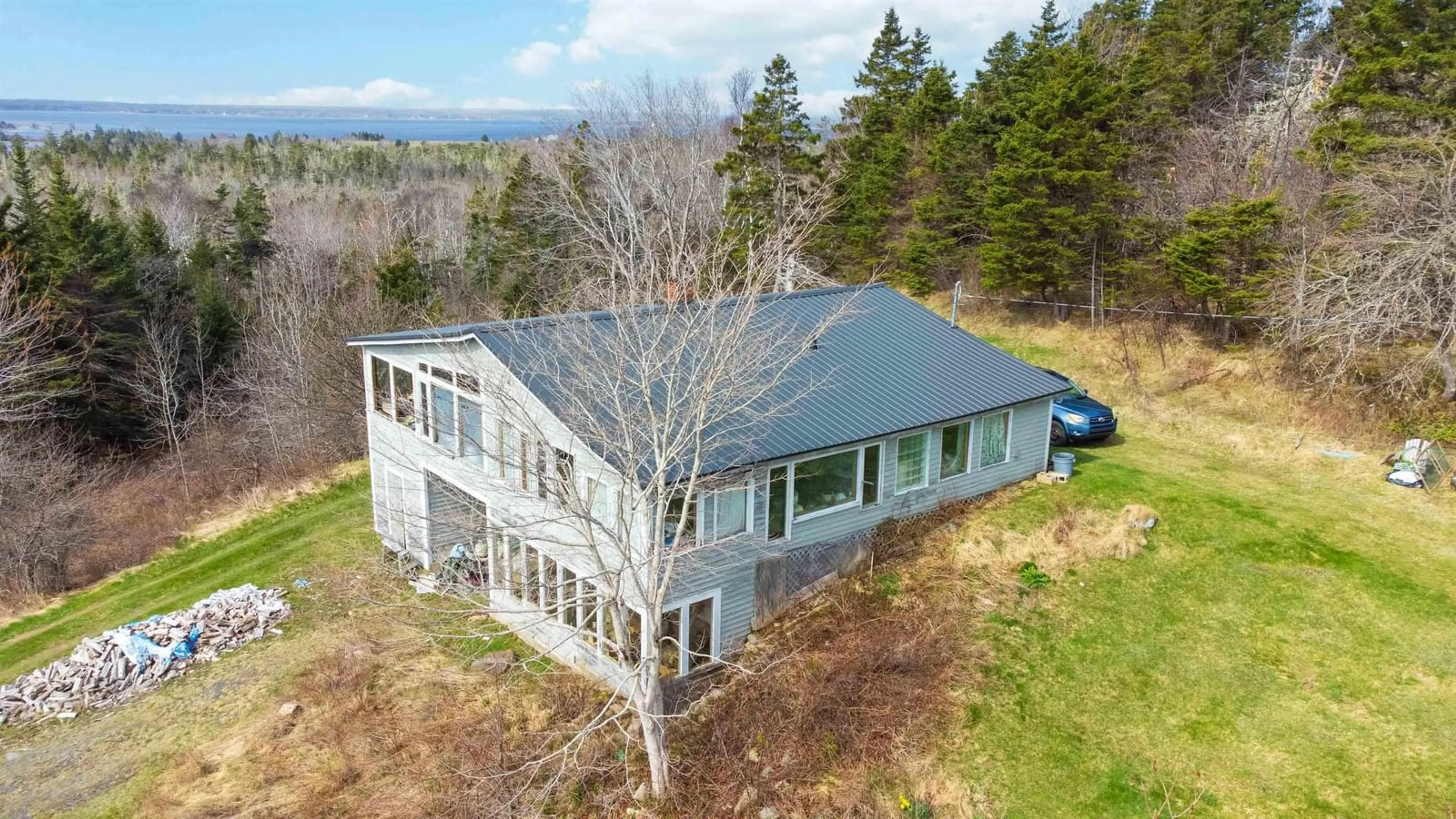 A pic from outside/outdoor area/front of a property/back of a property/a pic from drone, water/lake/river/ocean view for 8169 Highway 331, Cherry Hill Nova Scotia B0J 2H0