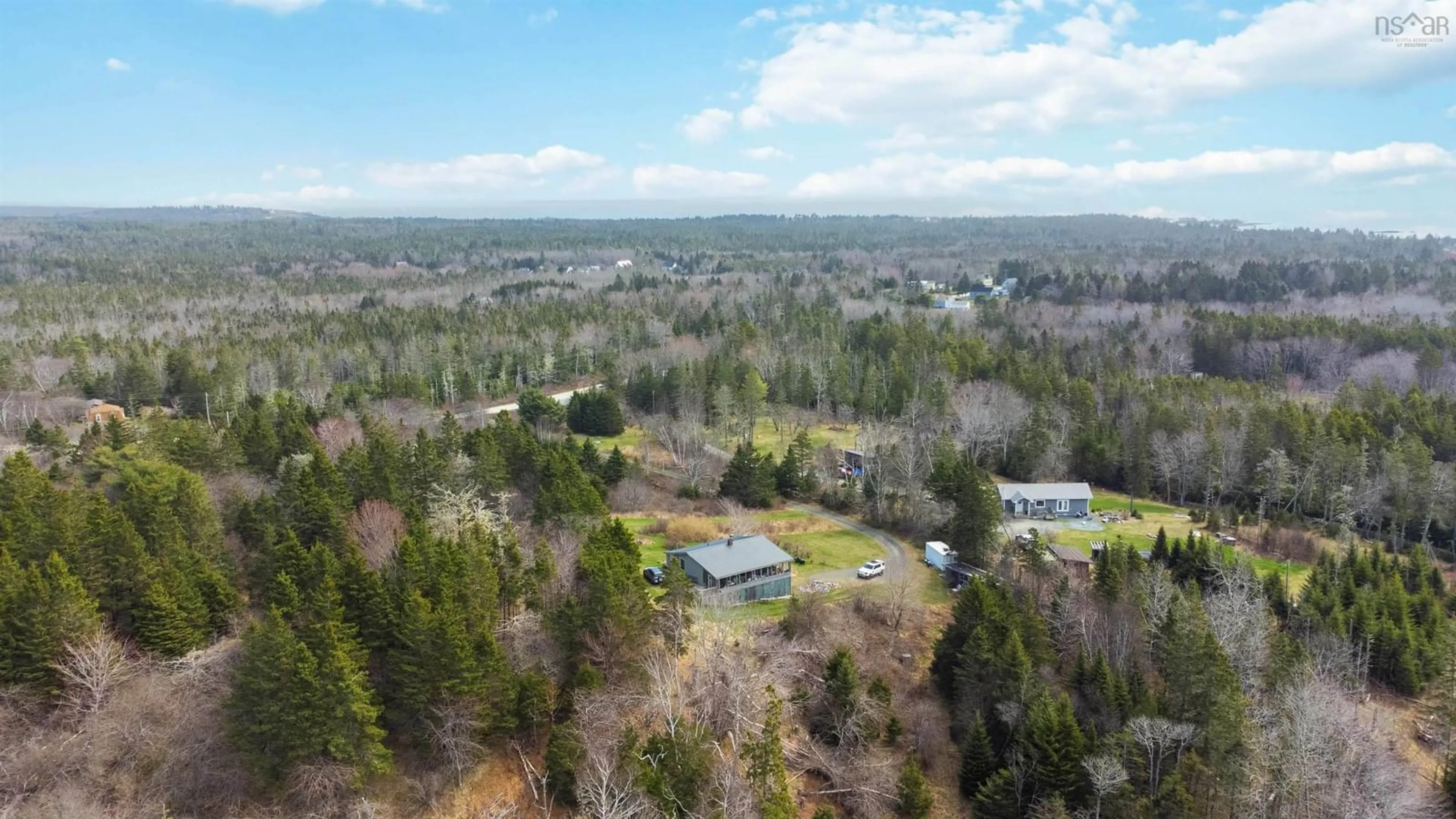 A pic from outside/outdoor area/front of a property/back of a property/a pic from drone, forest/trees view for 8169 Highway 331, Cherry Hill Nova Scotia B0J 2H0