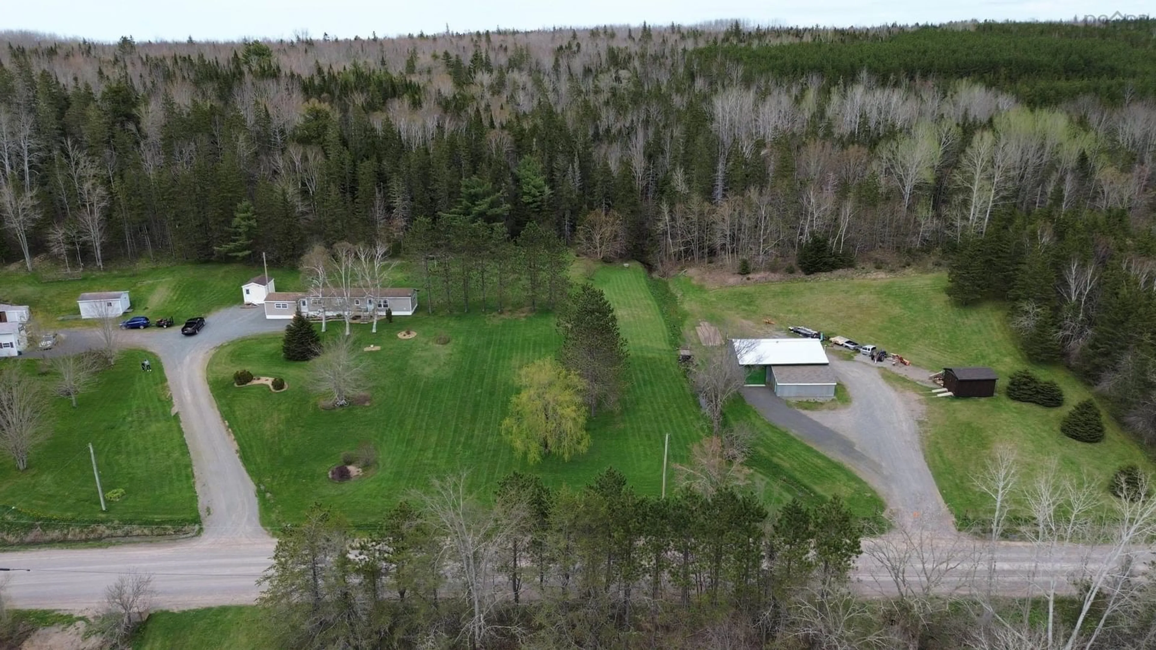 A pic from outside/outdoor area/front of a property/back of a property/a pic from drone, forest/trees view for 1824 Glen Rd, Glen Road Nova Scotia B2G 2L3