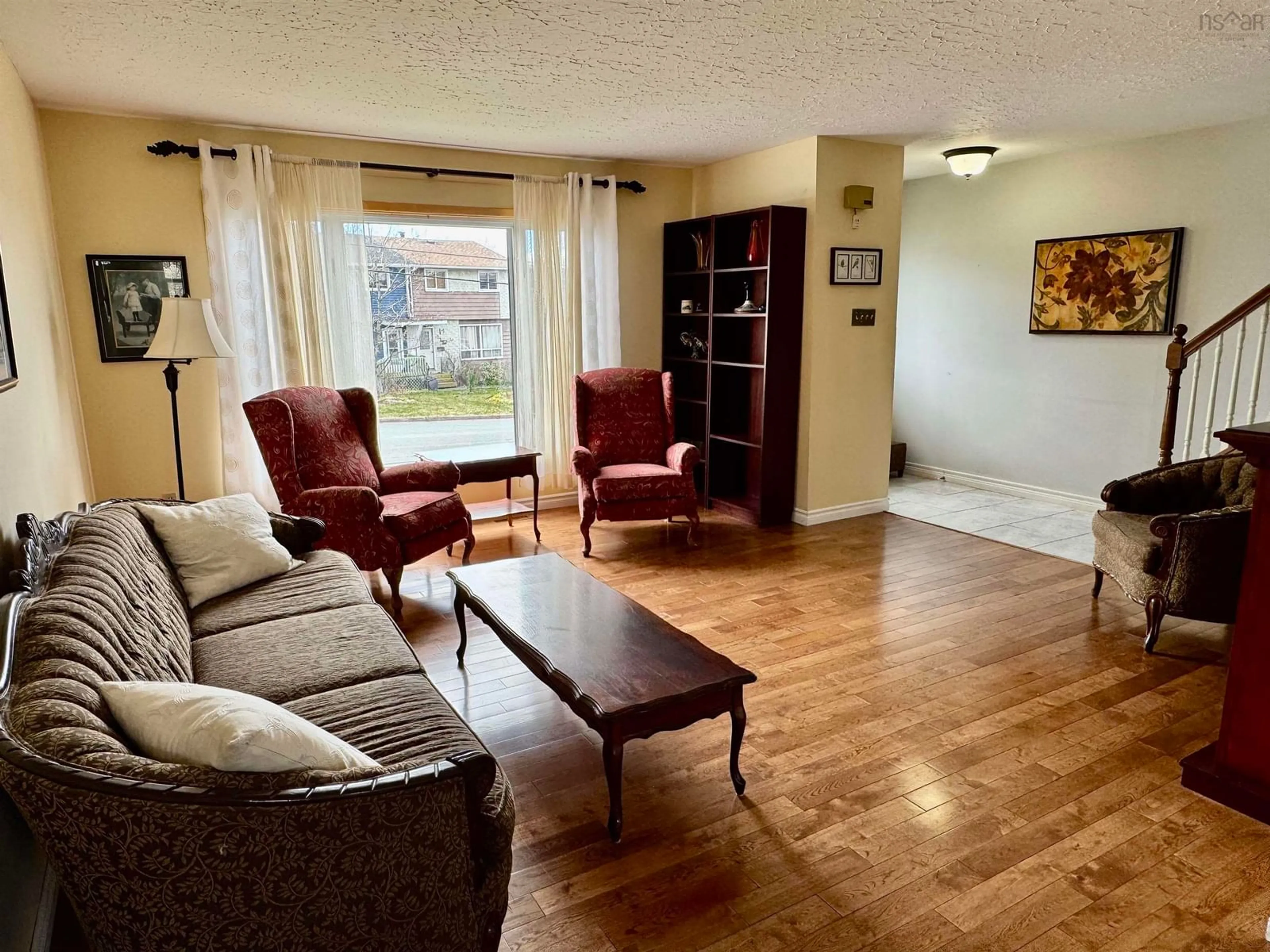 Living room with furniture, wood/laminate floor for 31 Lillian Dr, Dartmouth Nova Scotia B2W 4B3
