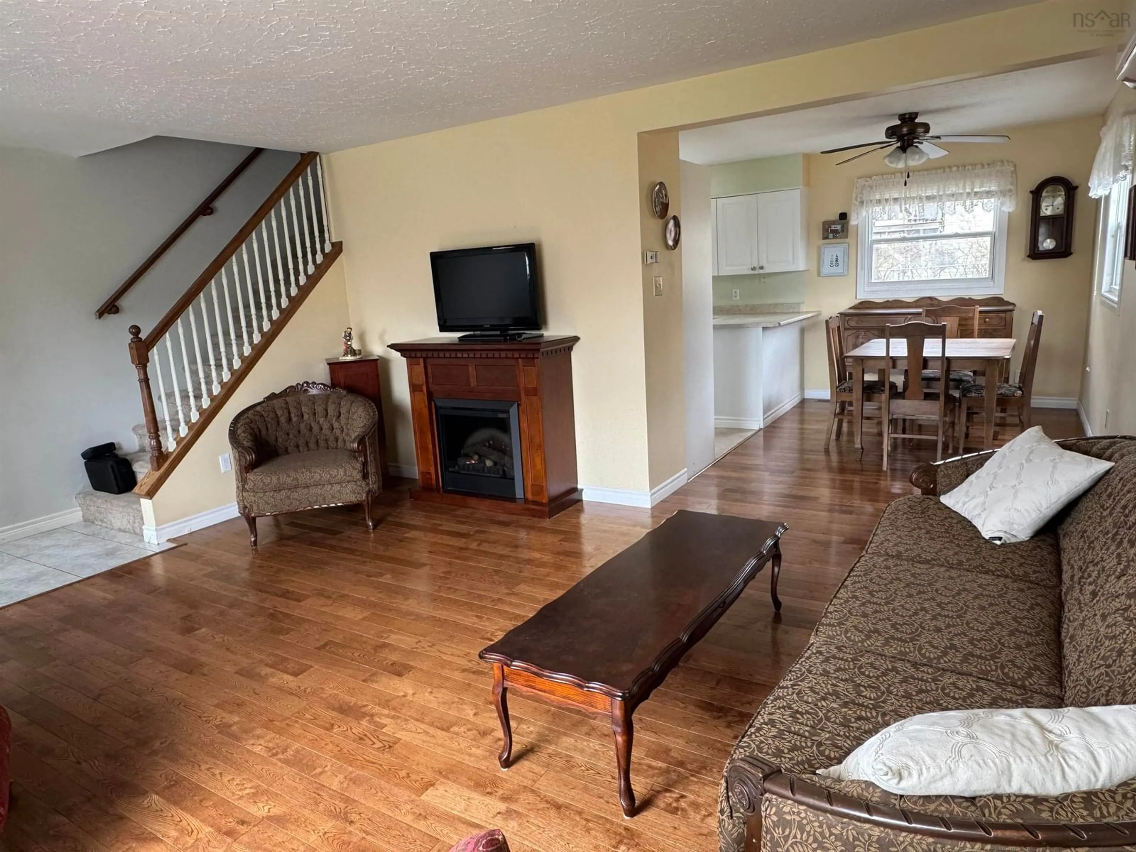 Living room with furniture, wood/laminate floor for 31 Lillian Dr, Dartmouth Nova Scotia B2W 4B3