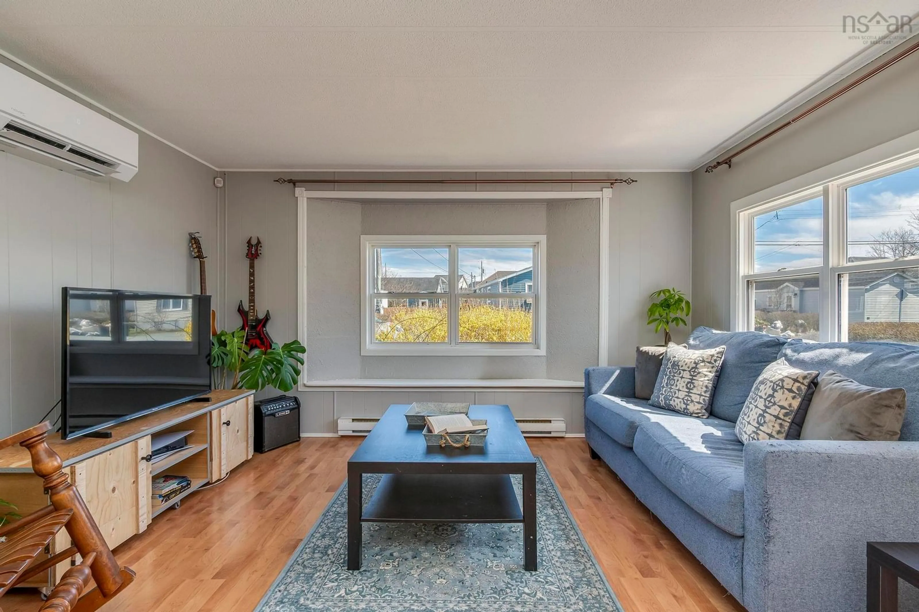 Living room with furniture, wood/laminate floor for 50 Birchill Dr, Eastern Passage Nova Scotia B3G 1C7