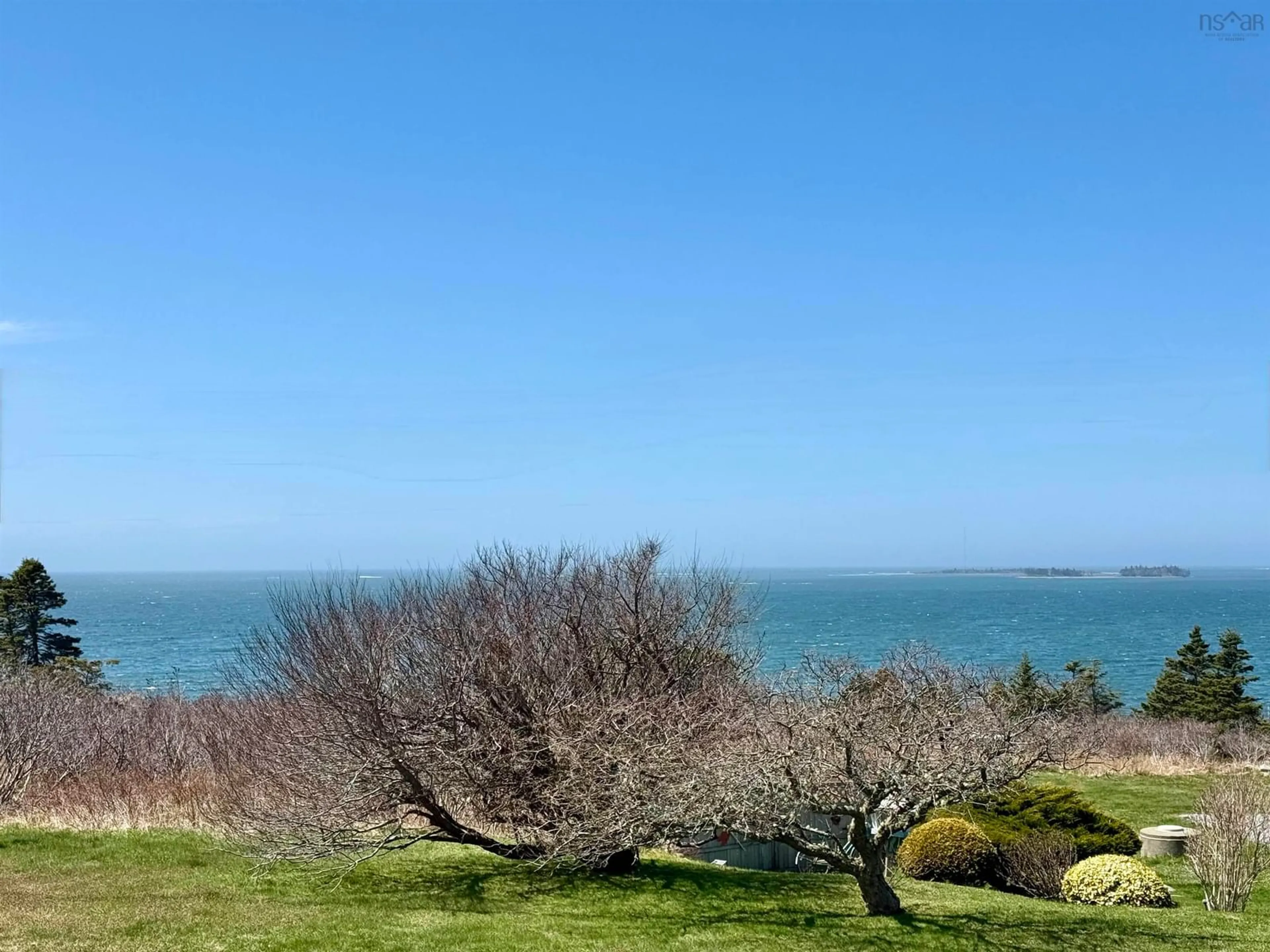 A pic from outside/outdoor area/front of a property/back of a property/a pic from drone, water/lake/river/ocean view for 6248 Highway 3, Lower Woods Harbour Nova Scotia B0W 2E0