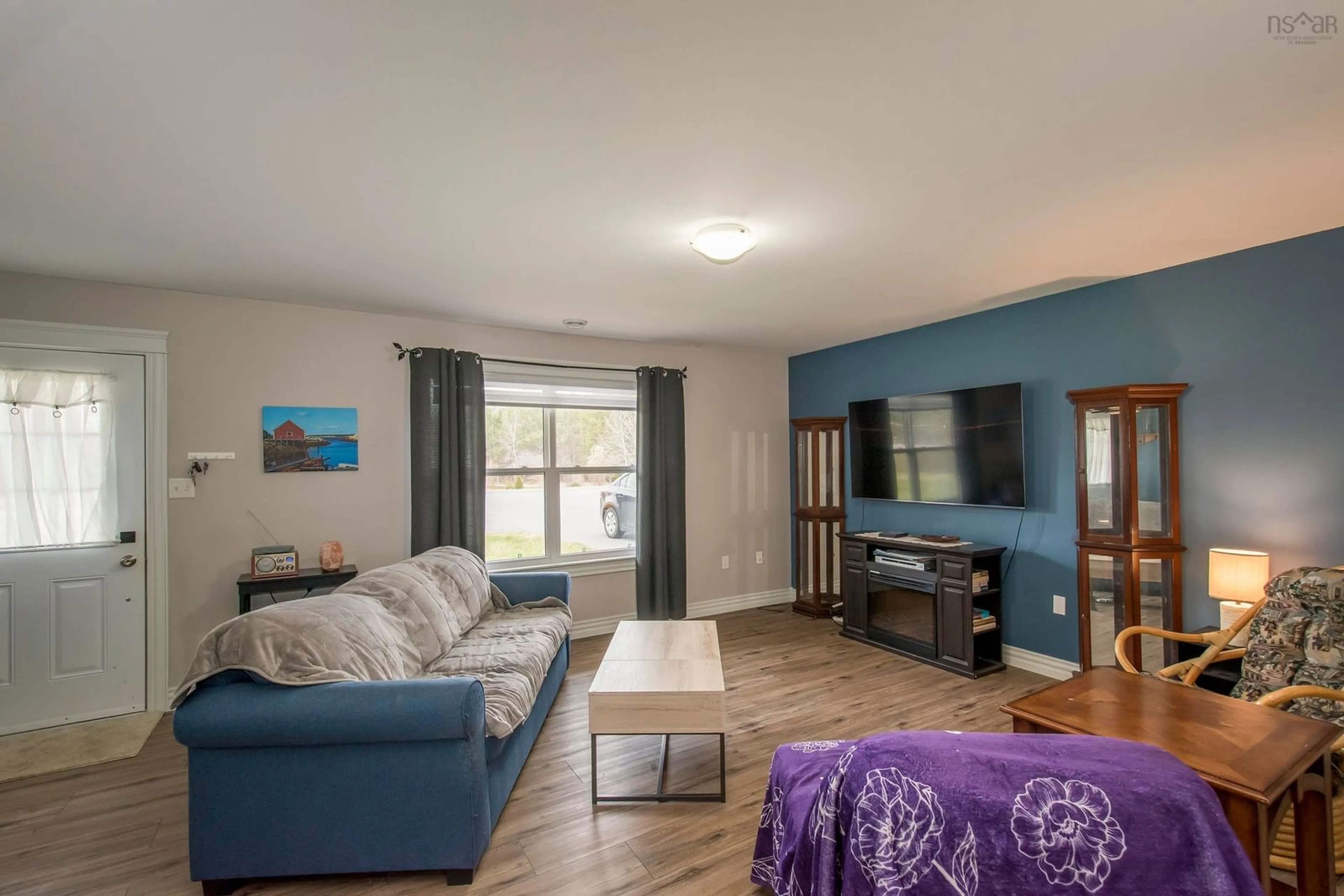 Living room with furniture, wood/laminate floor for 2206/2208 Highway 201, Greenwood Square Nova Scotia B0P 1R0
