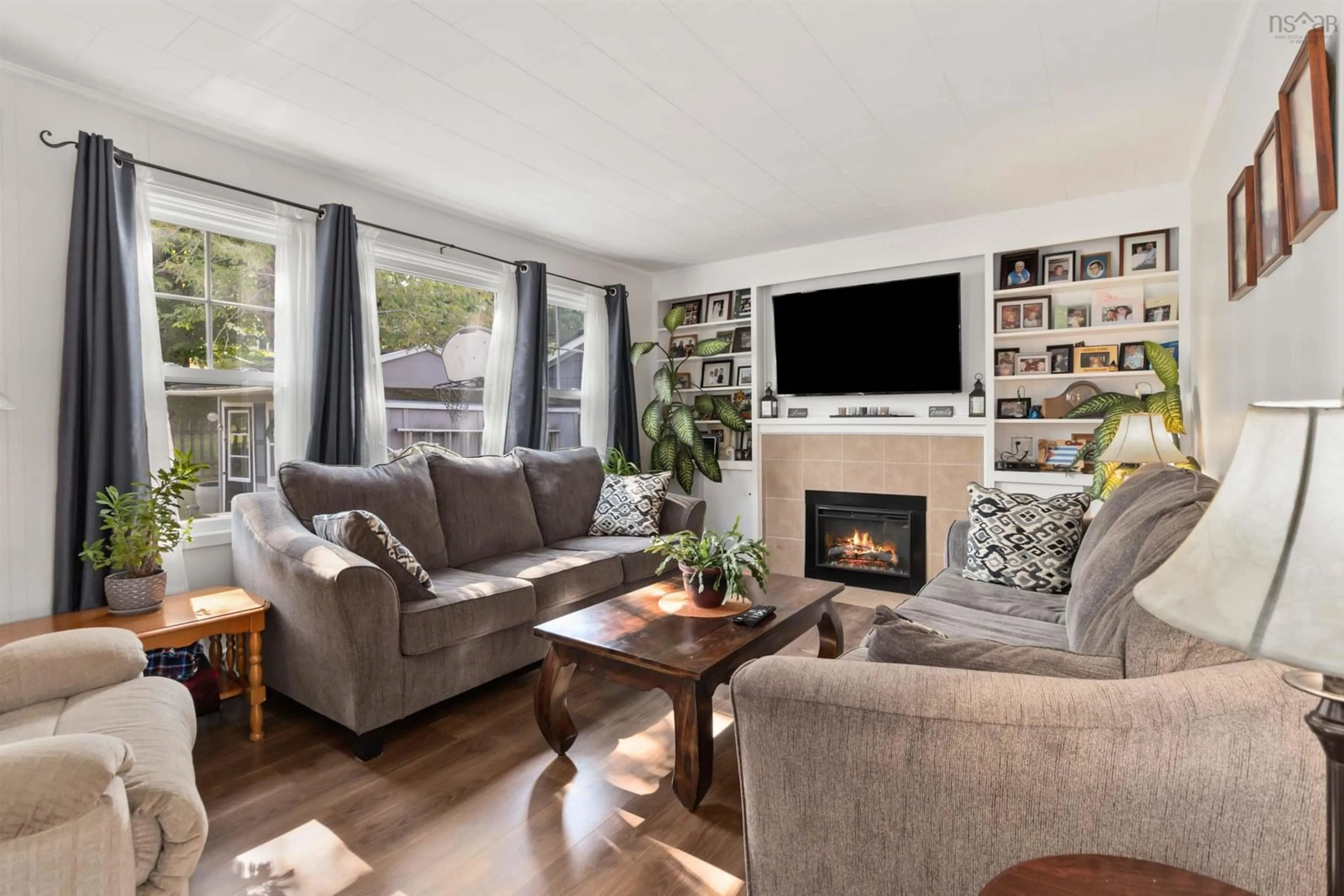 Living room with furniture, wood/laminate floor for 43 Glenridge Ave, Bridgewater Nova Scotia B4V 1T6