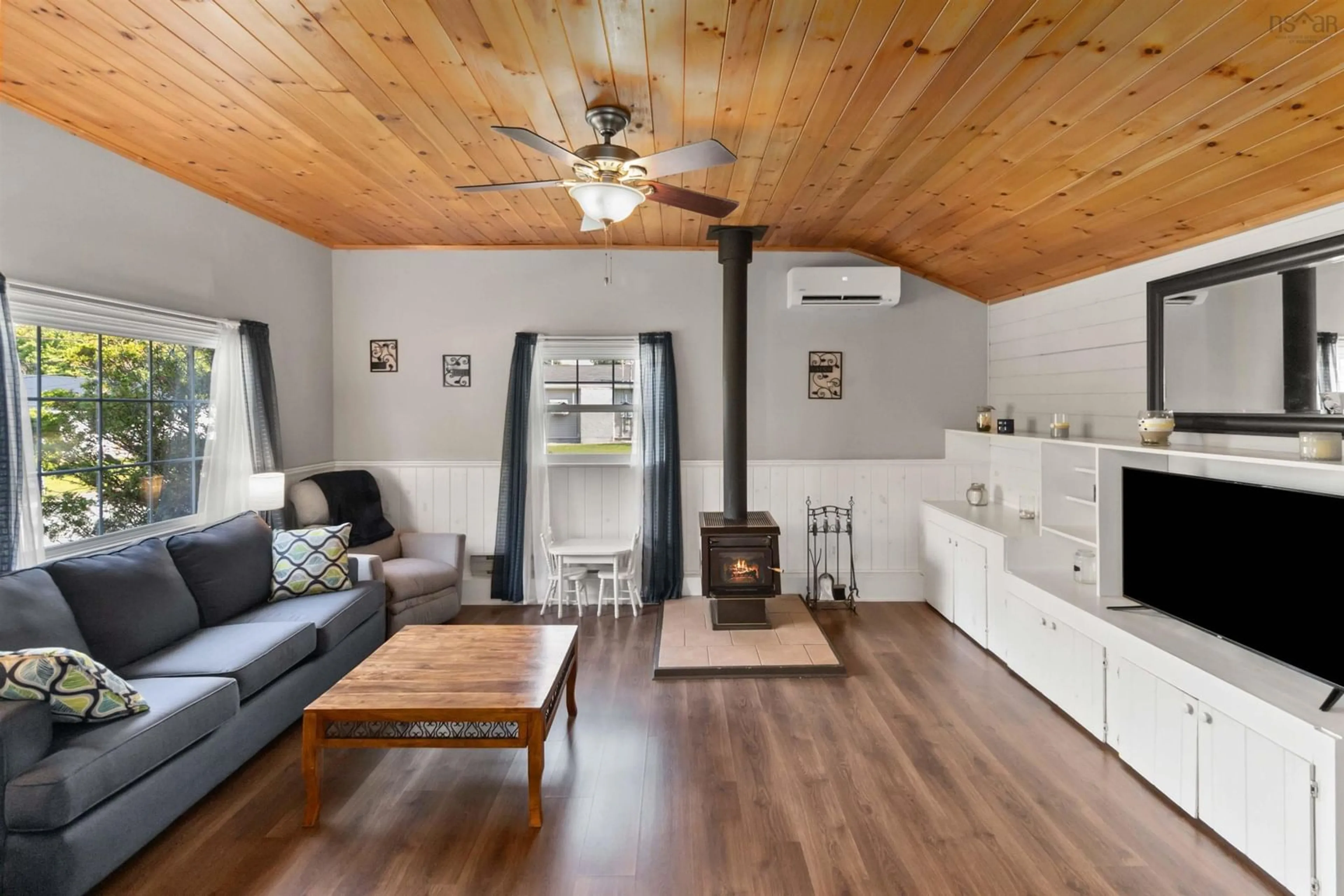 Living room with furniture, wood/laminate floor for 43 Glenridge Ave, Bridgewater Nova Scotia B4V 1T6