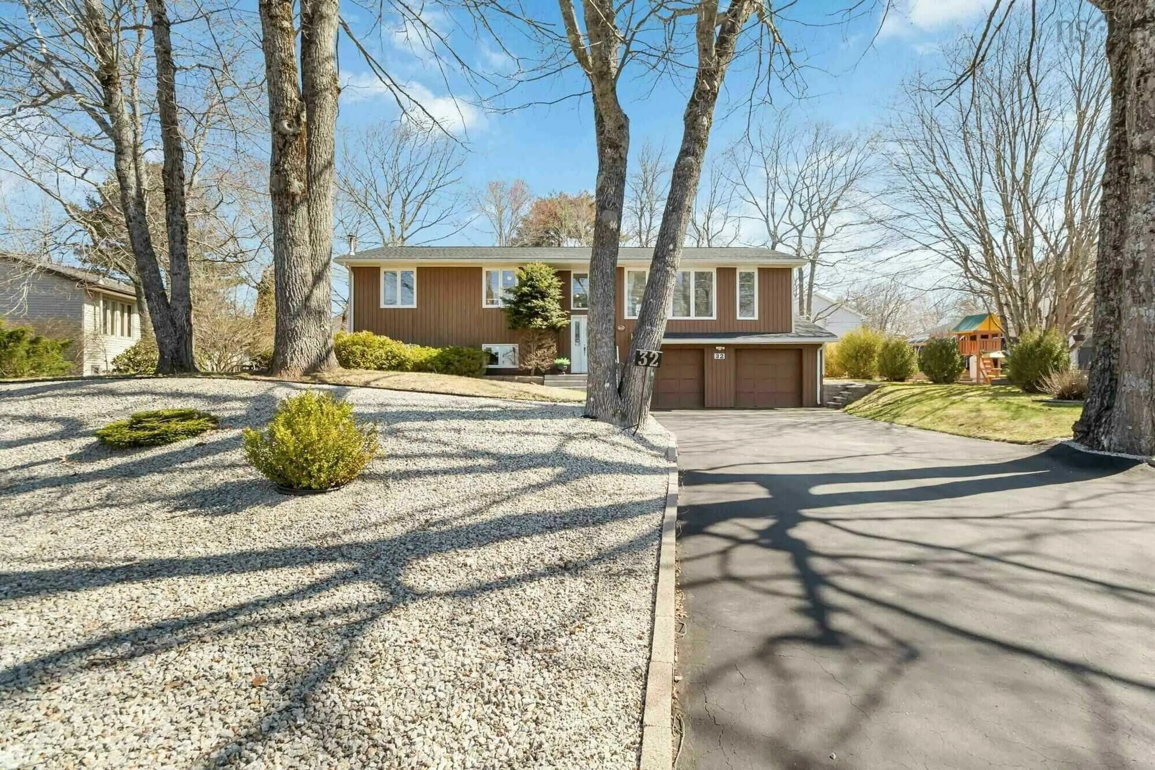 A pic from outside/outdoor area/front of a property/back of a property/a pic from drone, street for 32 Hopkins Dr, Bridgewater Nova Scotia B4V 3Z6