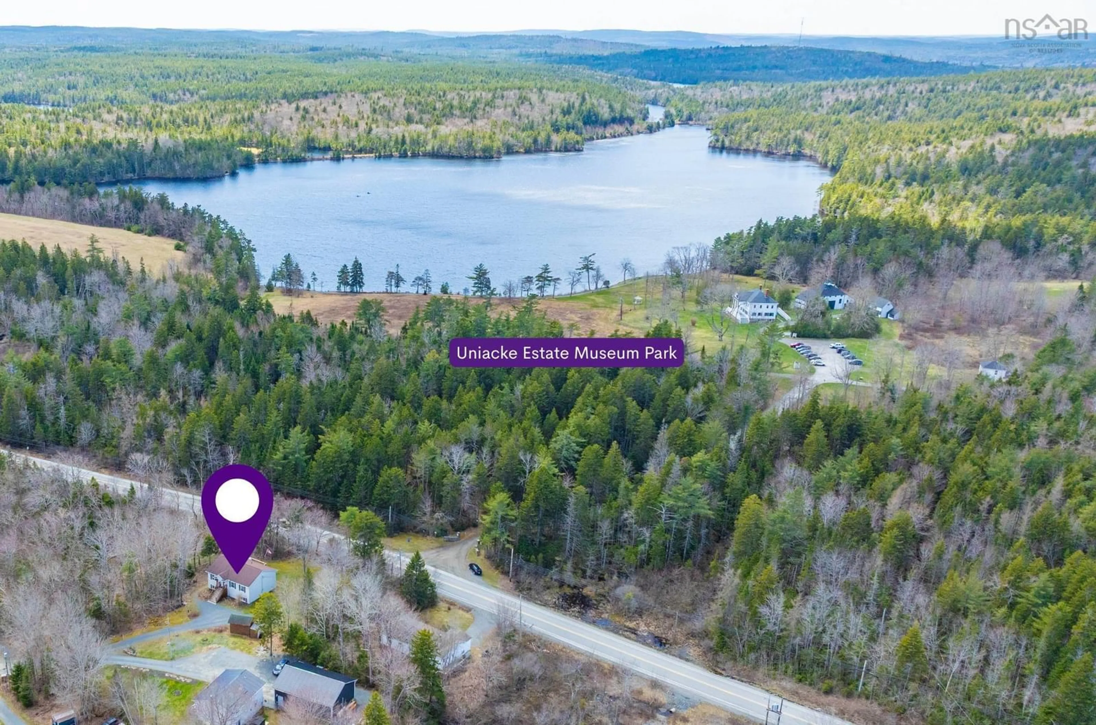A pic from outside/outdoor area/front of a property/back of a property/a pic from drone, water/lake/river/ocean view for 765 Highway 1, Mount Uniacke Nova Scotia B0N 1Z0