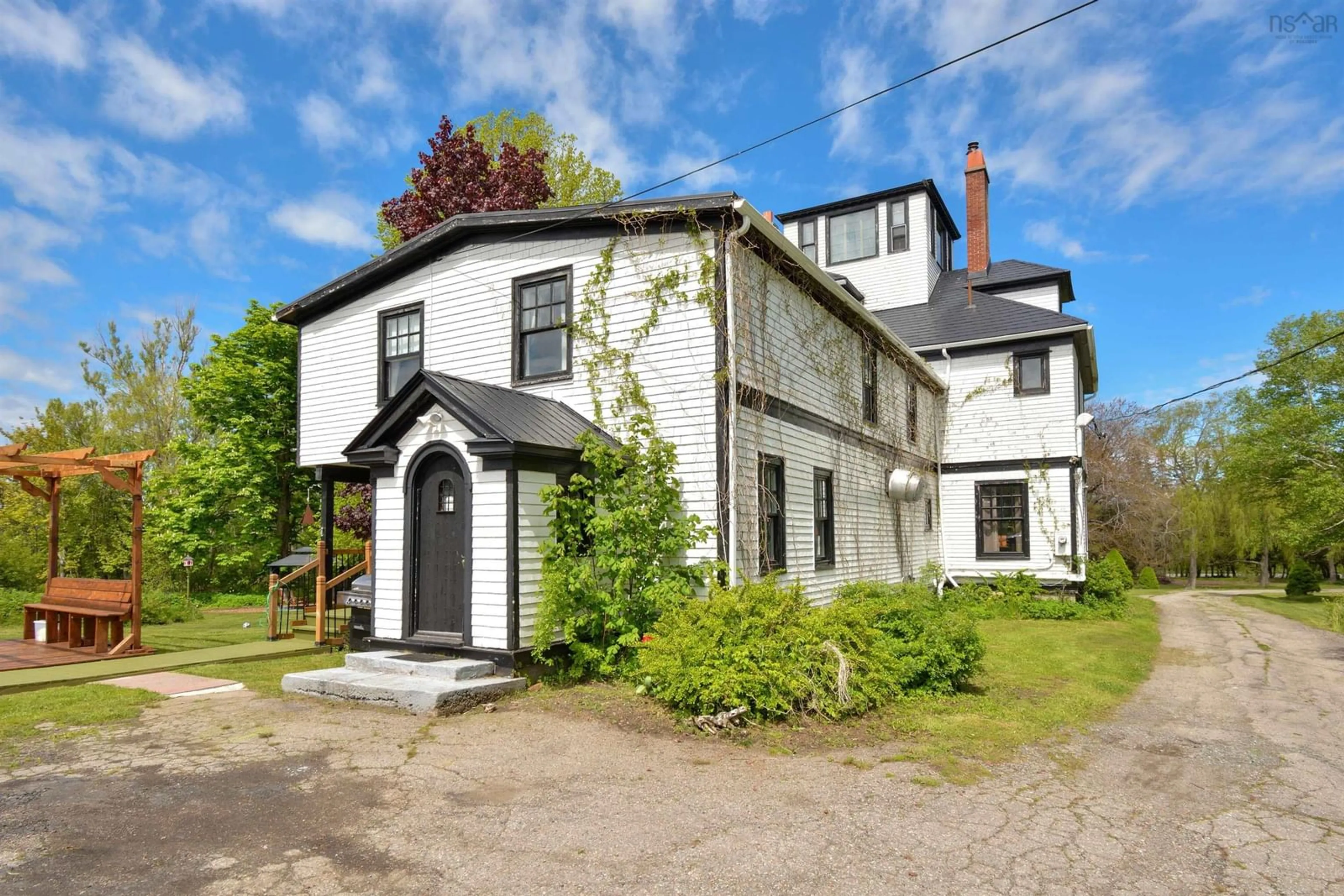 A pic from outside/outdoor area/front of a property/back of a property/a pic from drone, building for 317 Church Rd, Little Bras D'Or Nova Scotia B0E 3A3