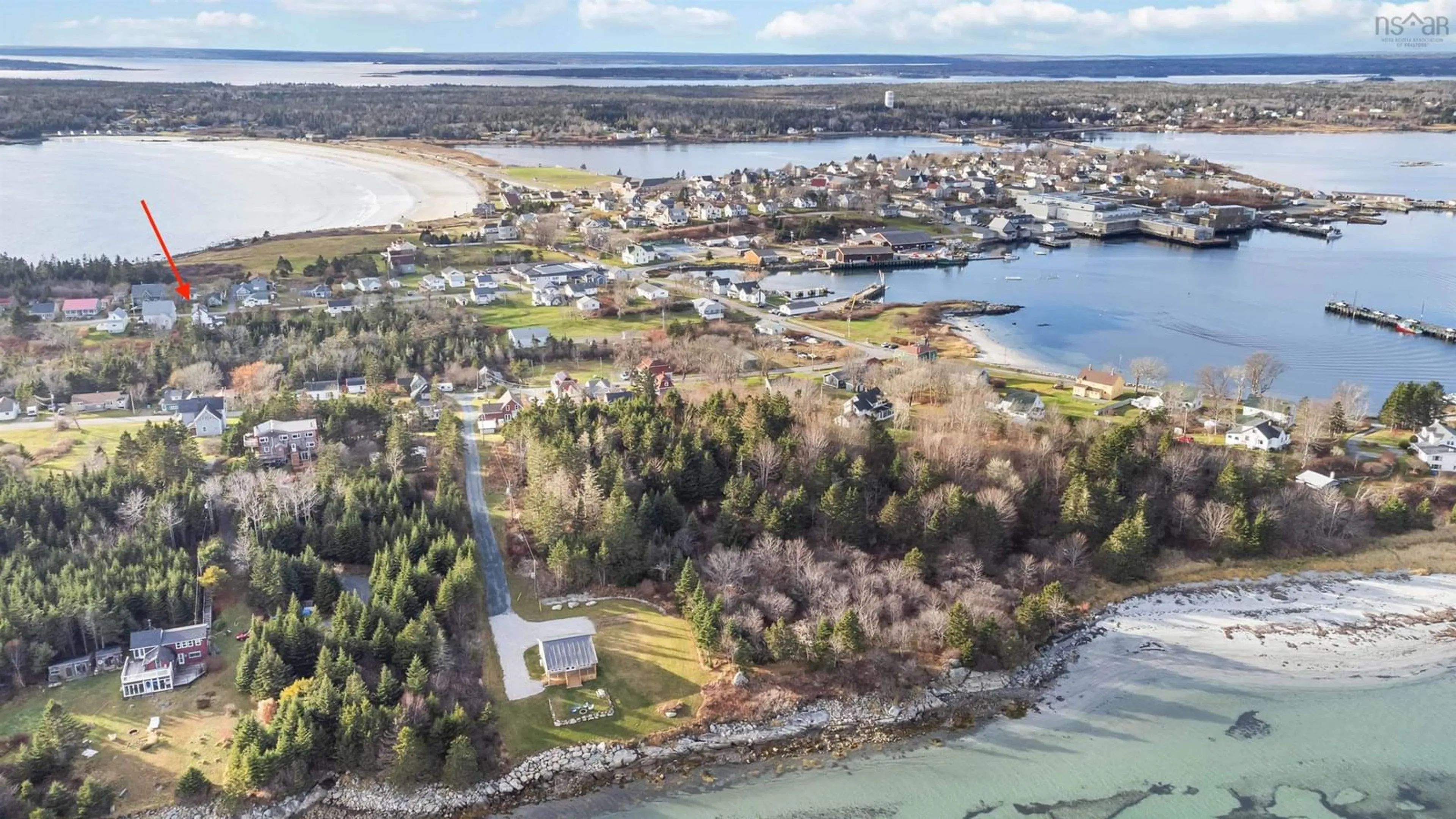 A pic from outside/outdoor area/front of a property/back of a property/a pic from drone, water/lake/river/ocean view for 39 Church St, Lockeport Nova Scotia B0T 1L0