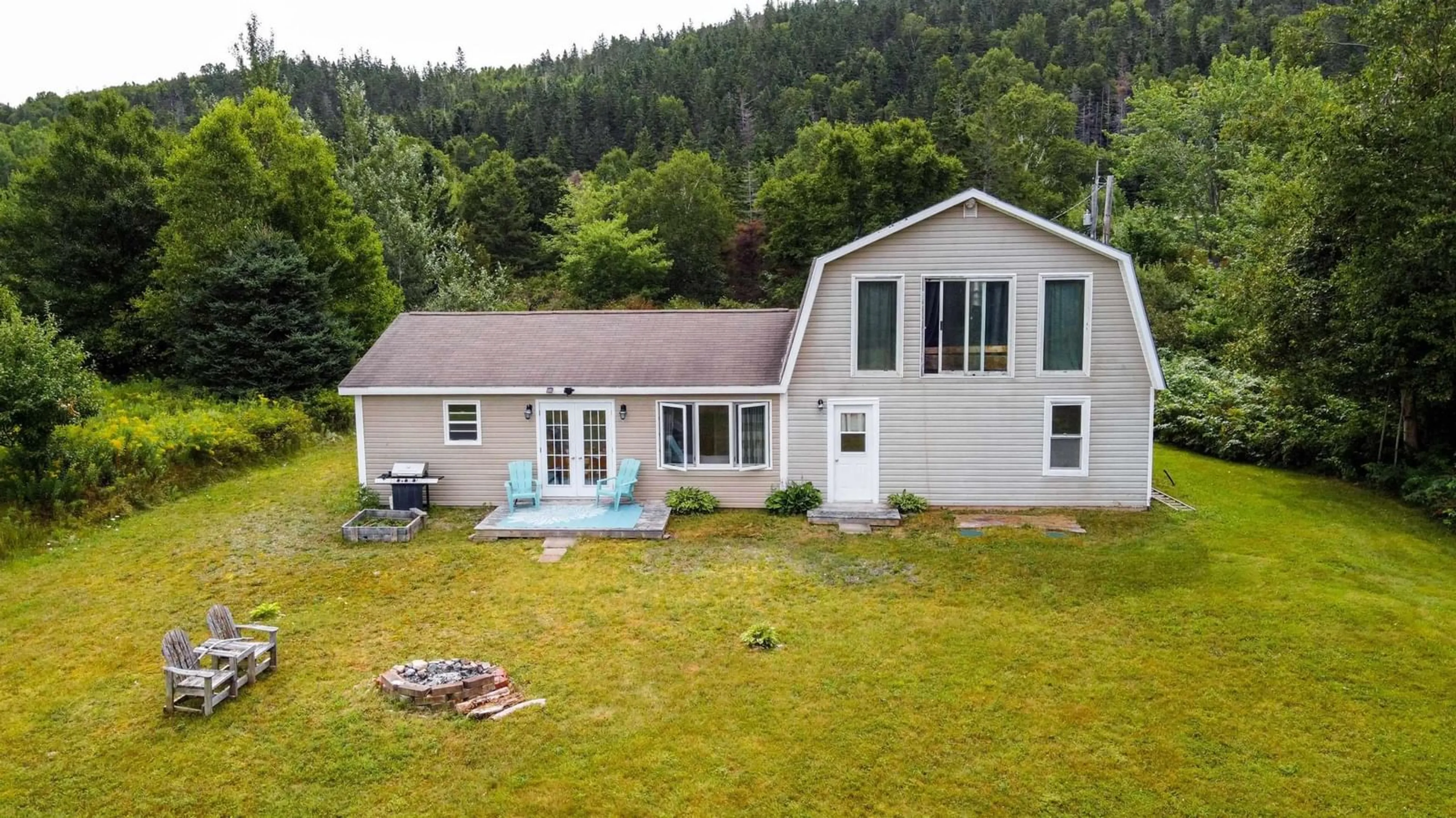 A pic from outside/outdoor area/front of a property/back of a property/a pic from drone, unknown for 8004 East Bay Highway, Big Pond Centre Nova Scotia B1J 1Z4