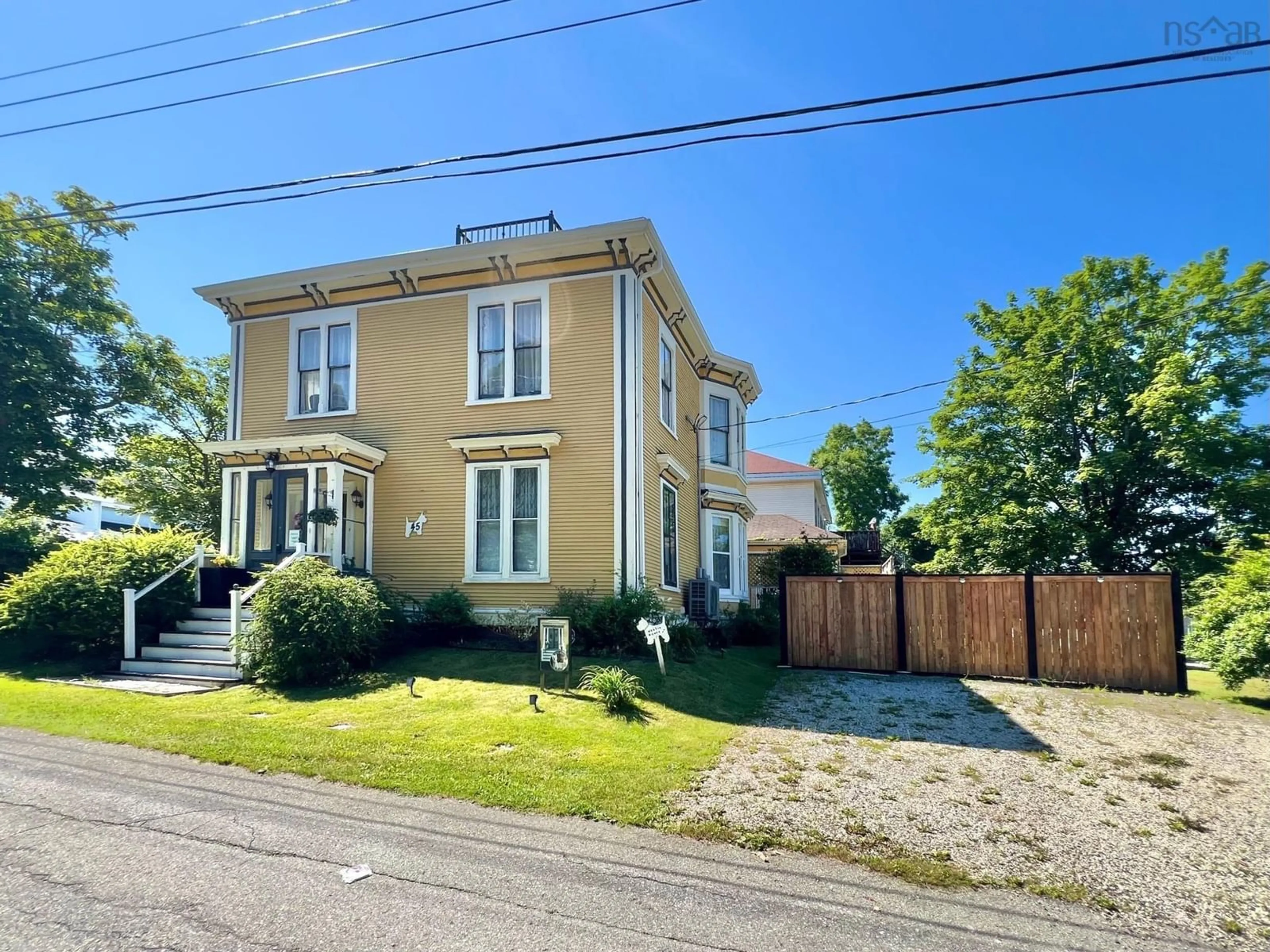 A pic from outside/outdoor area/front of a property/back of a property/a pic from drone, street for 45 Alma St, Yarmouth Nova Scotia B5A 3G7
