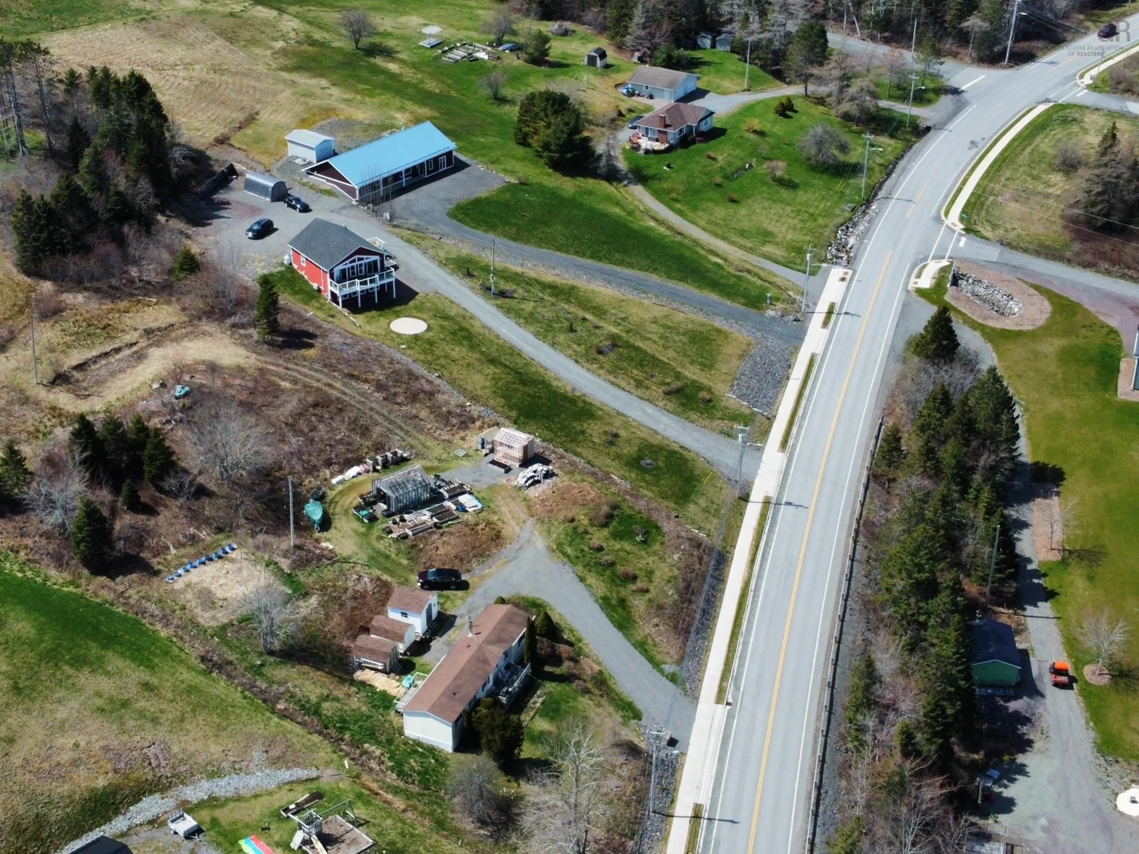 A pic from outside/outdoor area/front of a property/back of a property/a pic from drone, street for 10471 Hwy 16, Guysborough Nova Scotia B0H 1N0