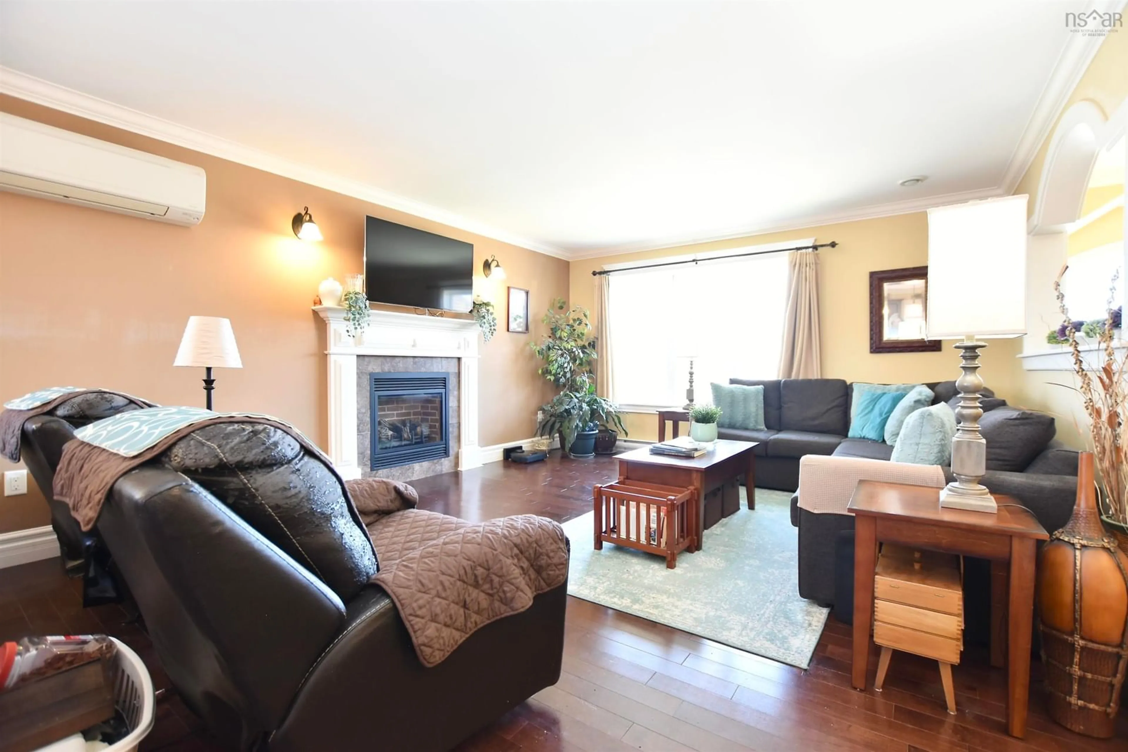Living room with furniture, wood/laminate floor for 5 Lucy Crt, Middle Sackville Nova Scotia B4E 0C8