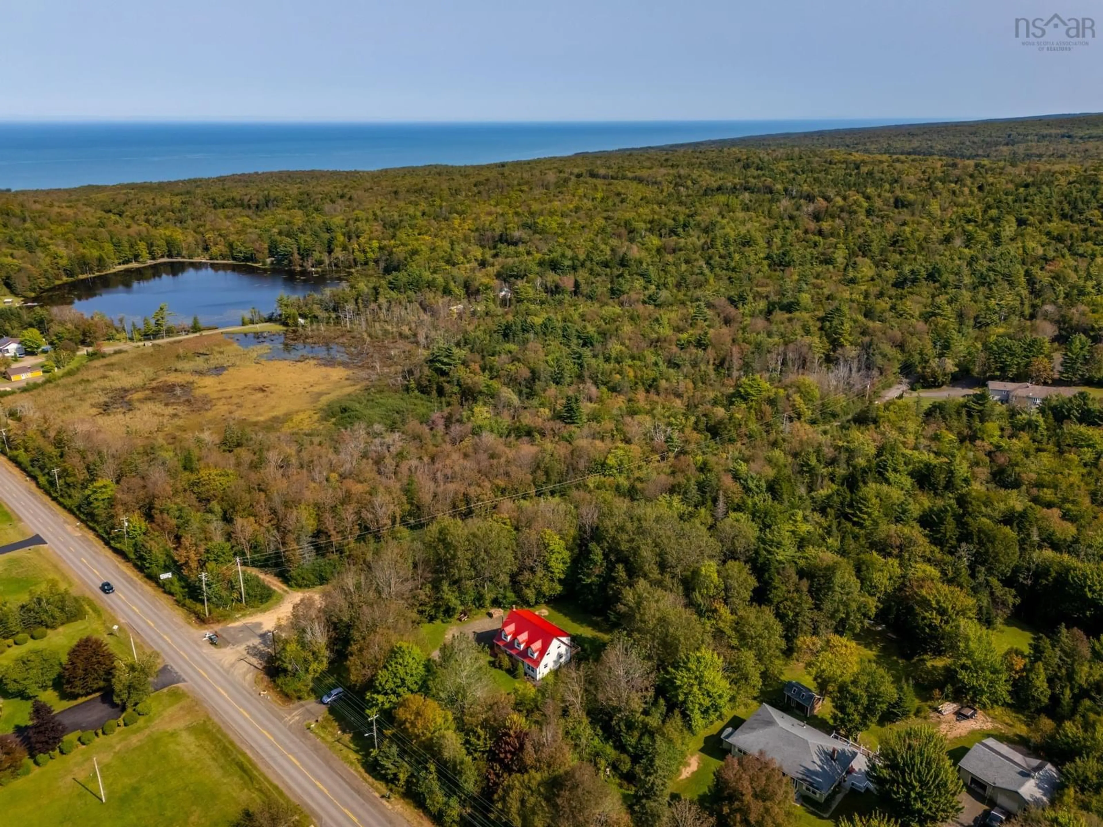 A pic from outside/outdoor area/front of a property/back of a property/a pic from drone, water/lake/river/ocean view for 790 Parker Mountain Rd, Parkers Cove Nova Scotia B0S 1A0