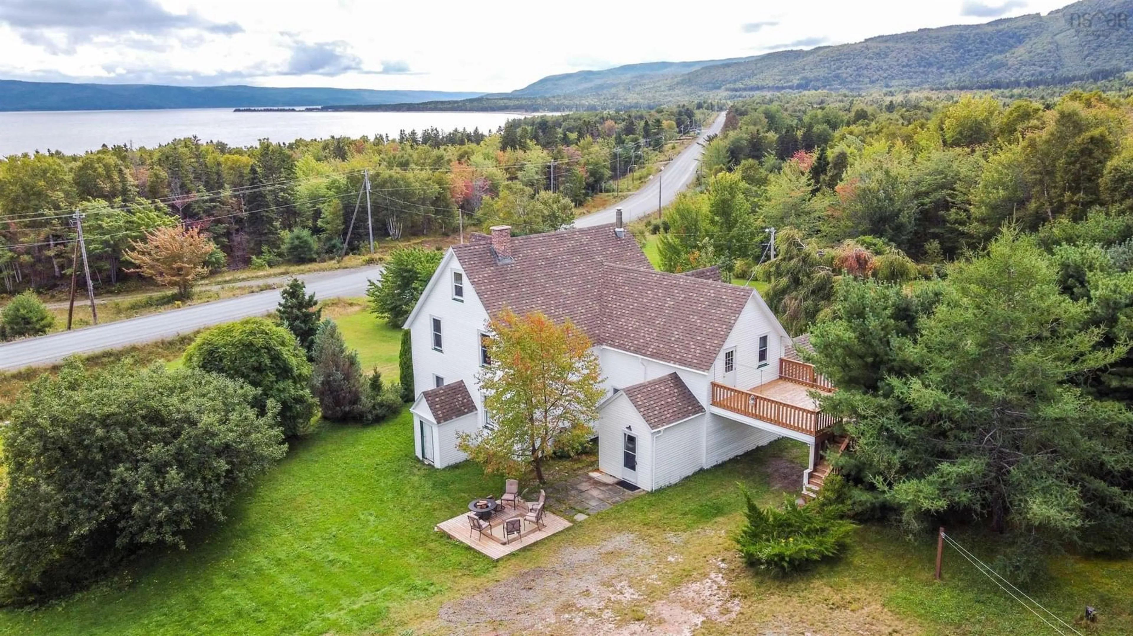 A pic from outside/outdoor area/front of a property/back of a property/a pic from drone, water/lake/river/ocean view for 45832 Cabot Trail, Indian Brook Nova Scotia B0C 1H0